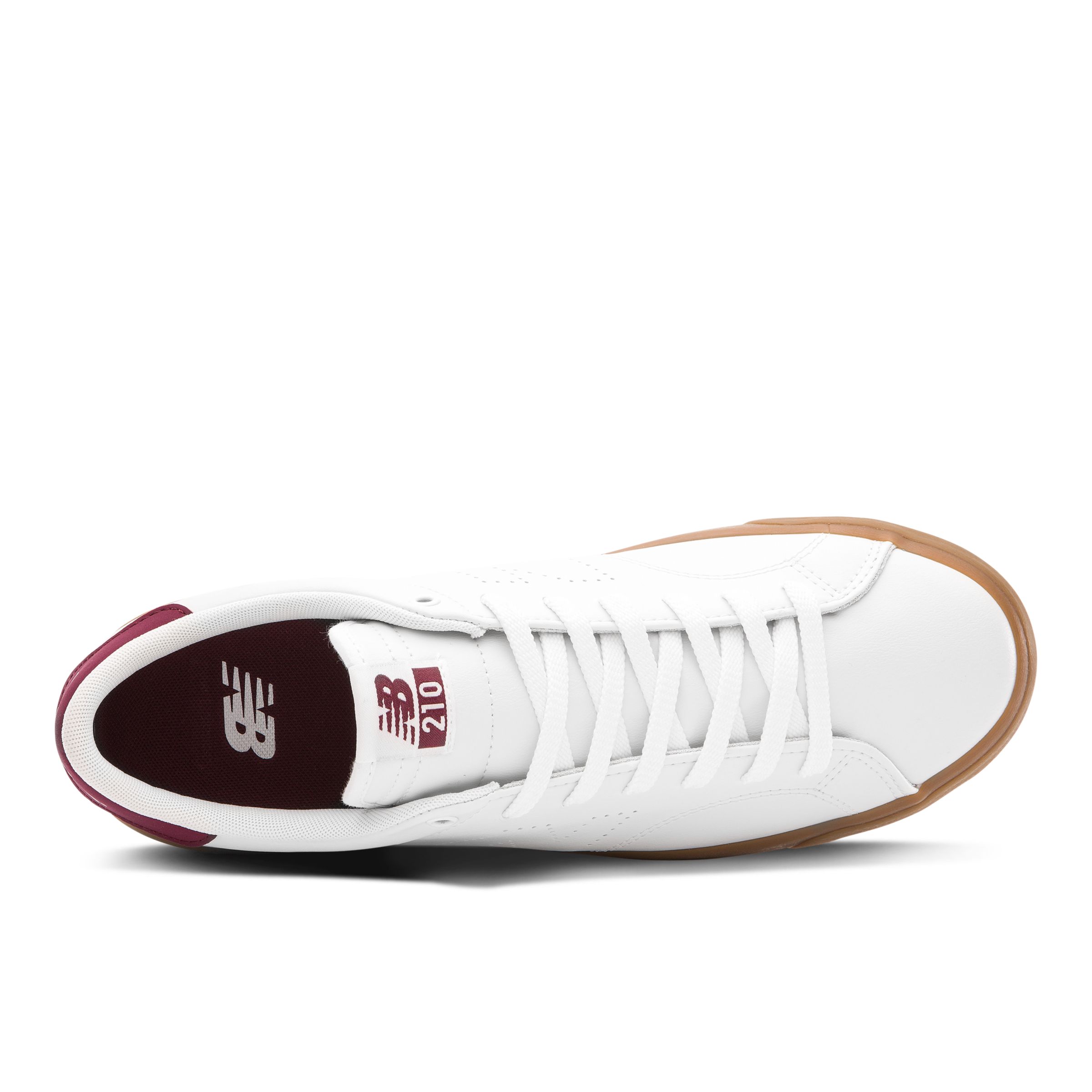 new balance 210 trainers in white with gum sole