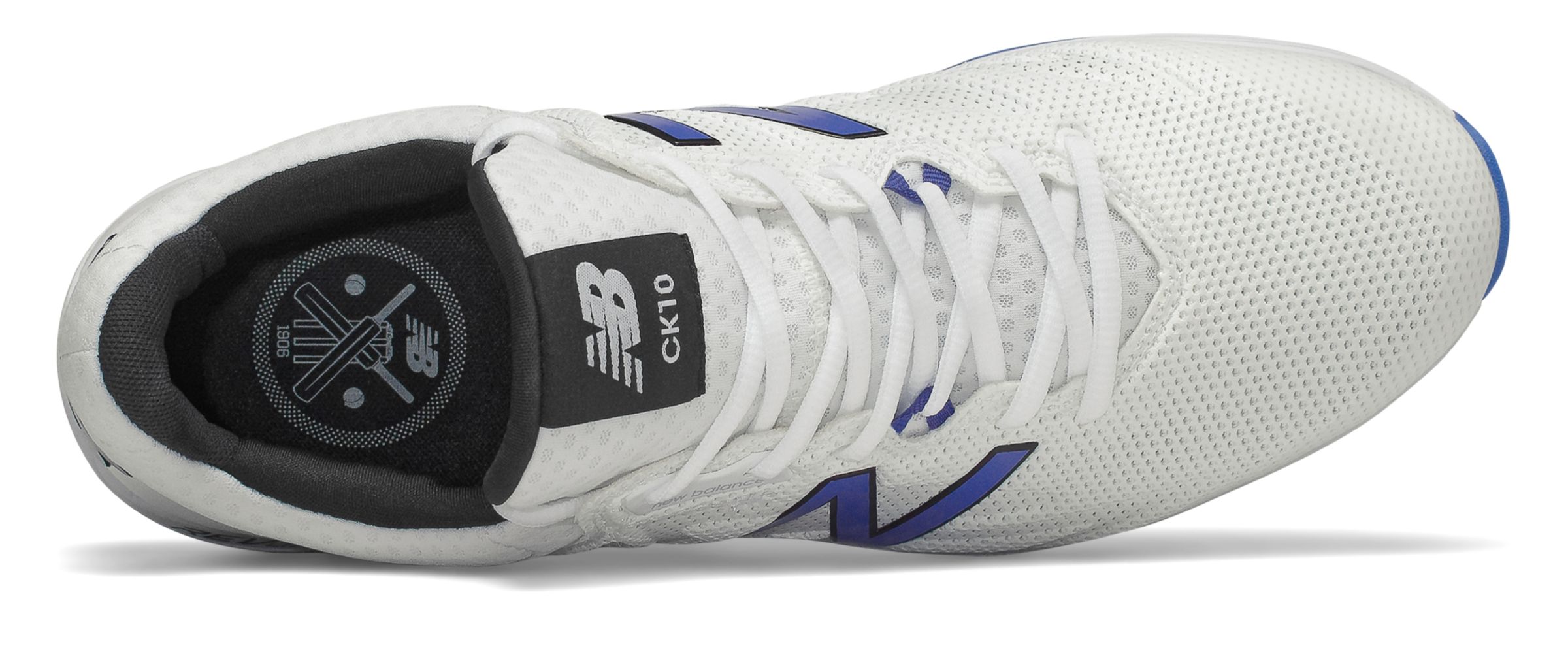 new balance junior cricket shoes