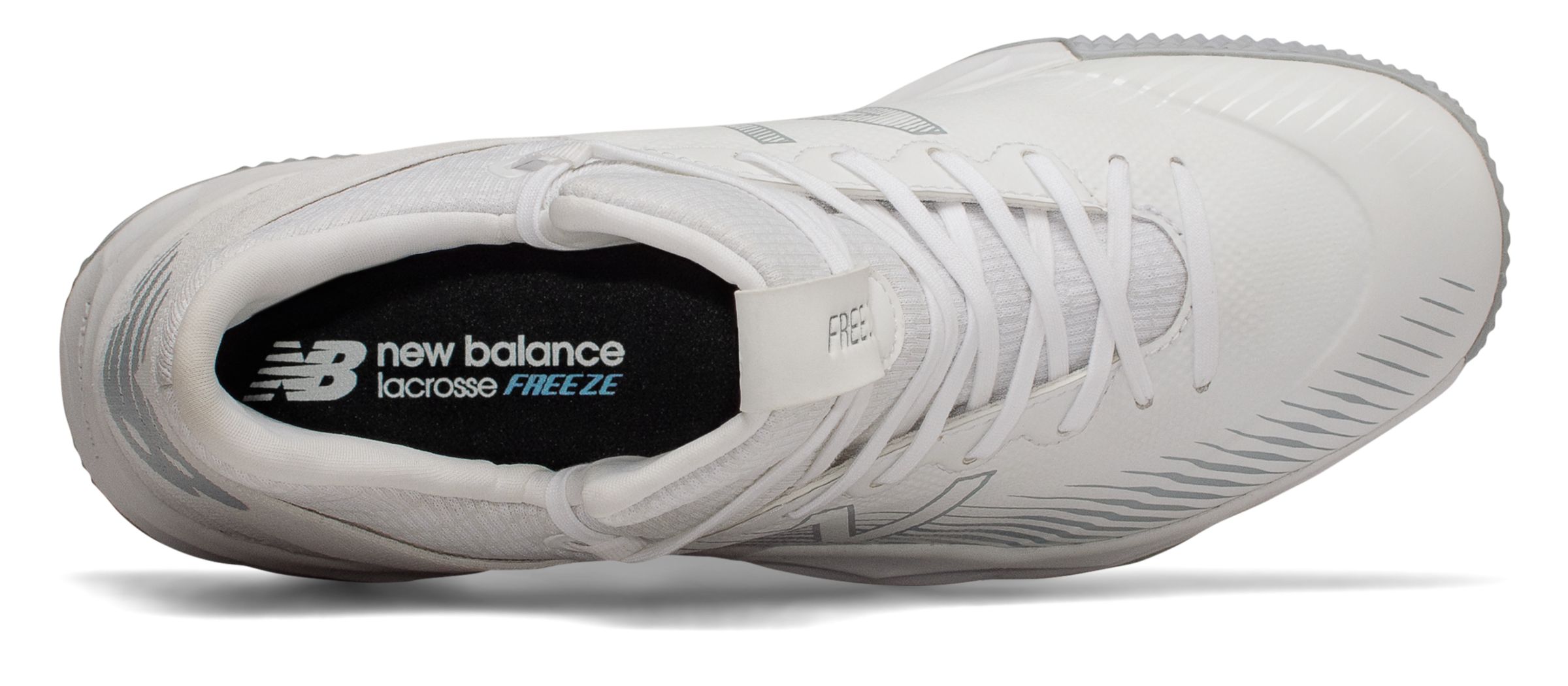 new balance freeze turf