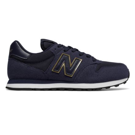 New balance pretas e douradas best sale