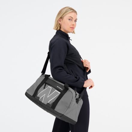 New Balance – Petit sac de sport de voyage avec poignées de transport et  bandoulière, noir, noir