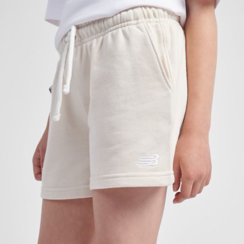 Детские шорты New Balance FT Small Logo Short, цвет: Льняной