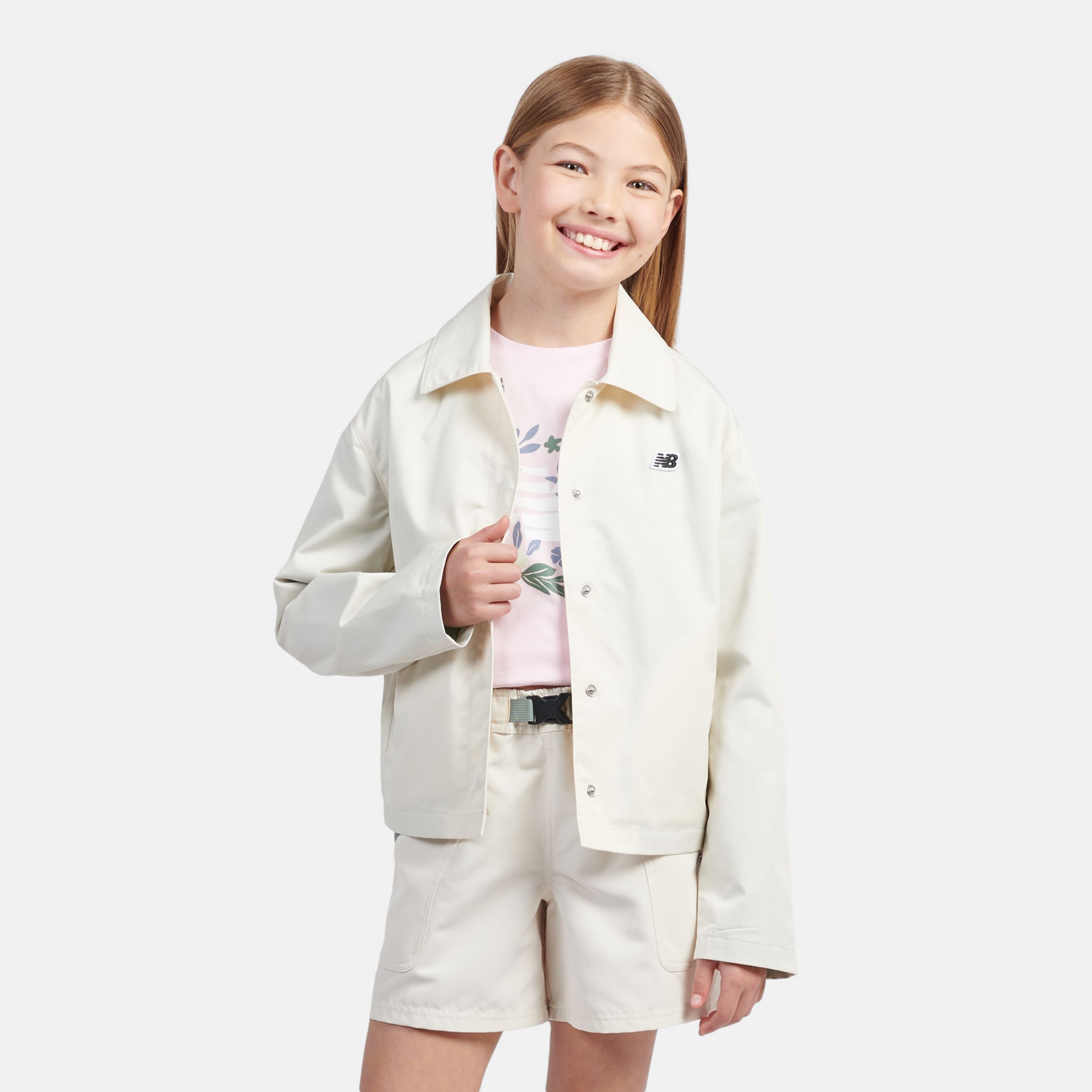 New Balance Girls Premium Coach Jacket in Beige Nylon, size 10-11 Y