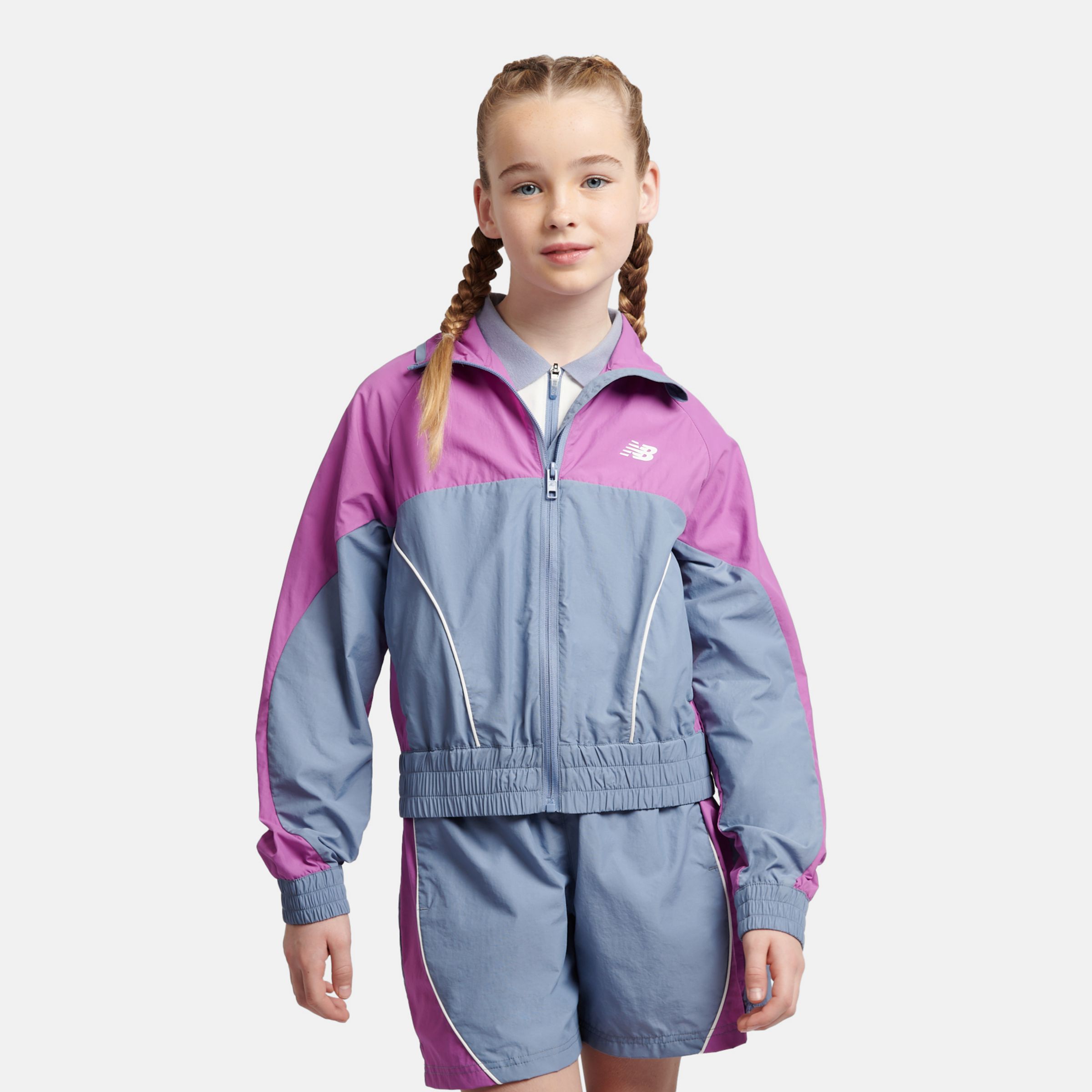 New Balance Girls Panelled Woven Track Jacket in Blue Nylon, size 10-11 Y