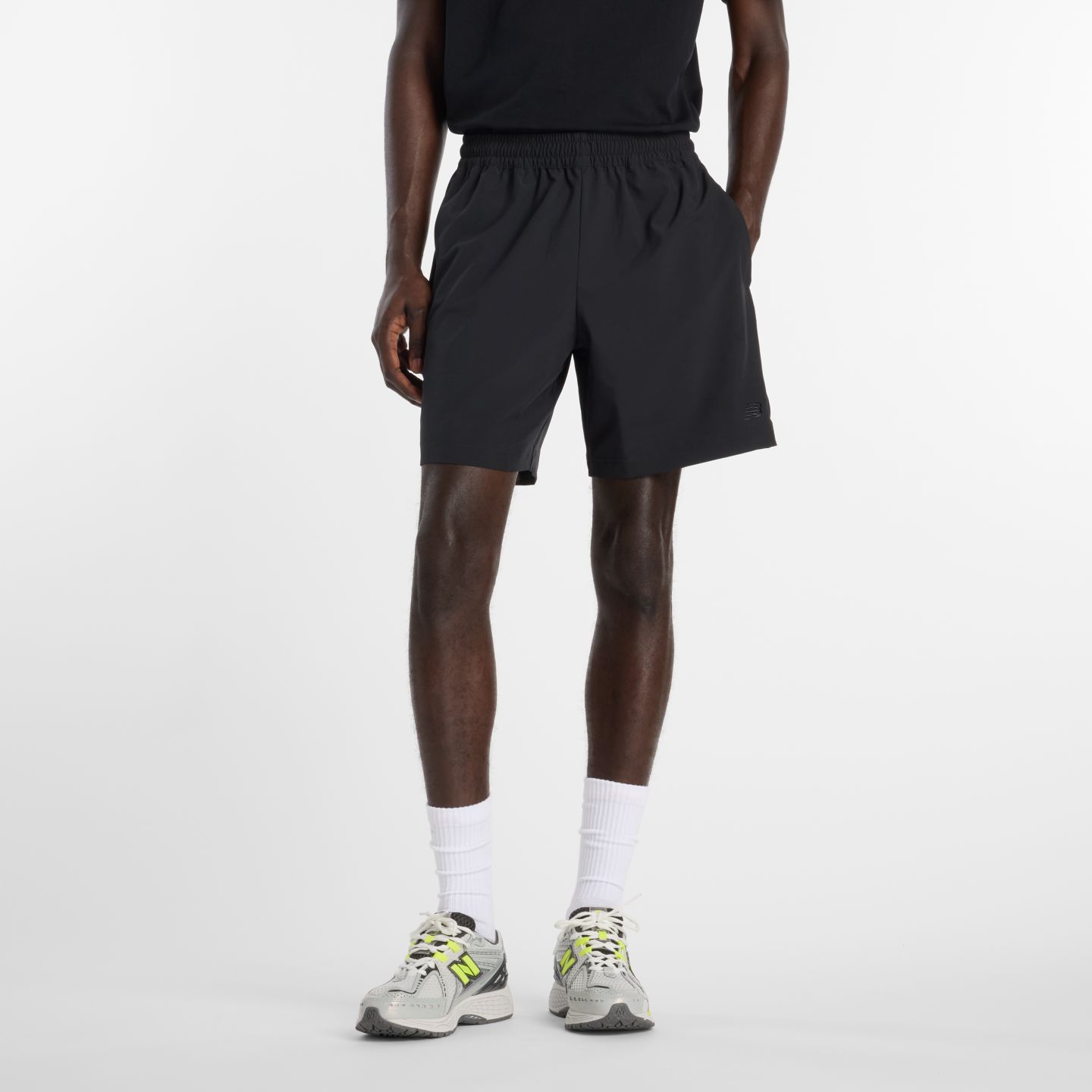 Мужские шорты New Balance Athletics Stretch Woven Short 7", цвет: Чёрный — фото 1