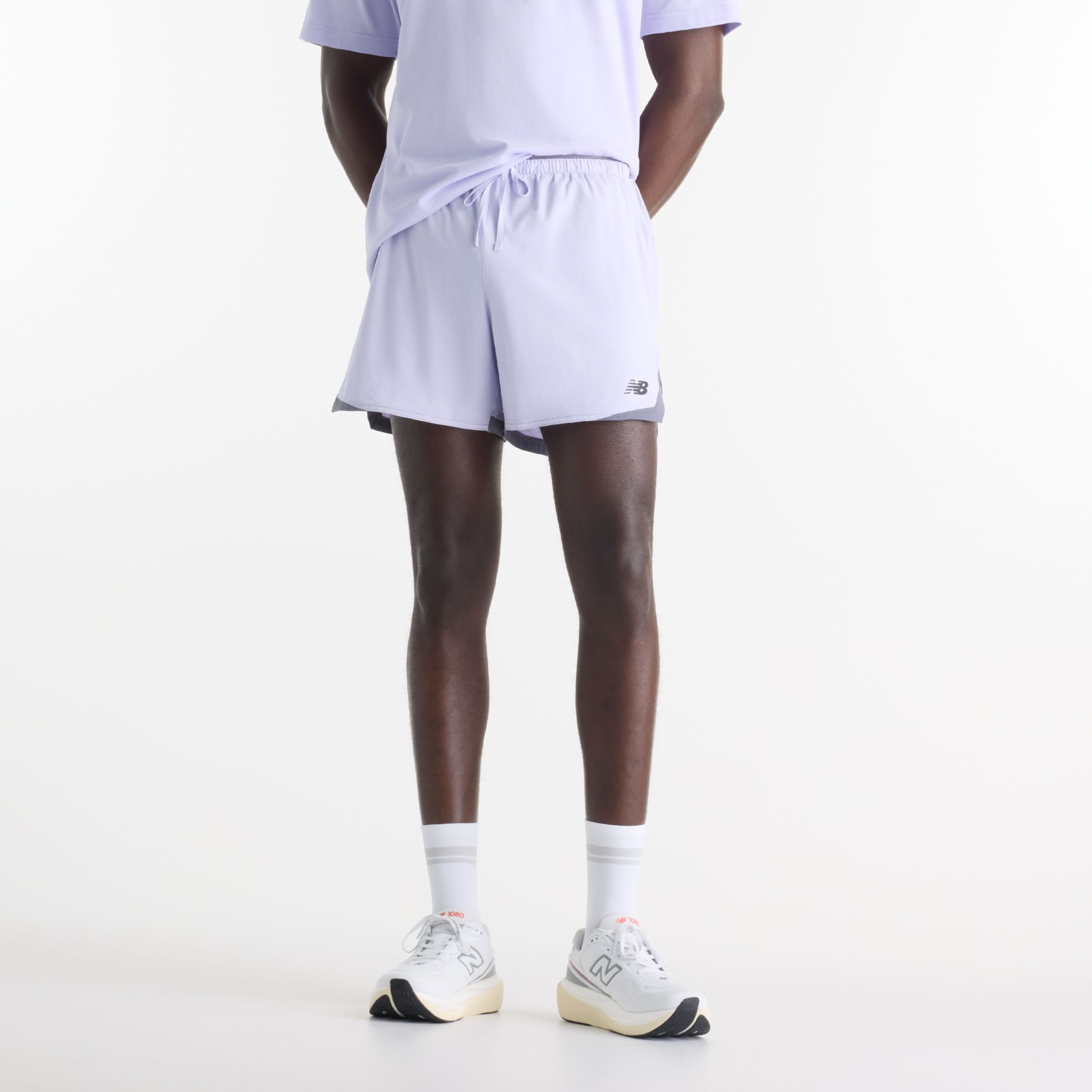 New Balance M&auml;n RC Essential Short 5" i Lila Polywoven