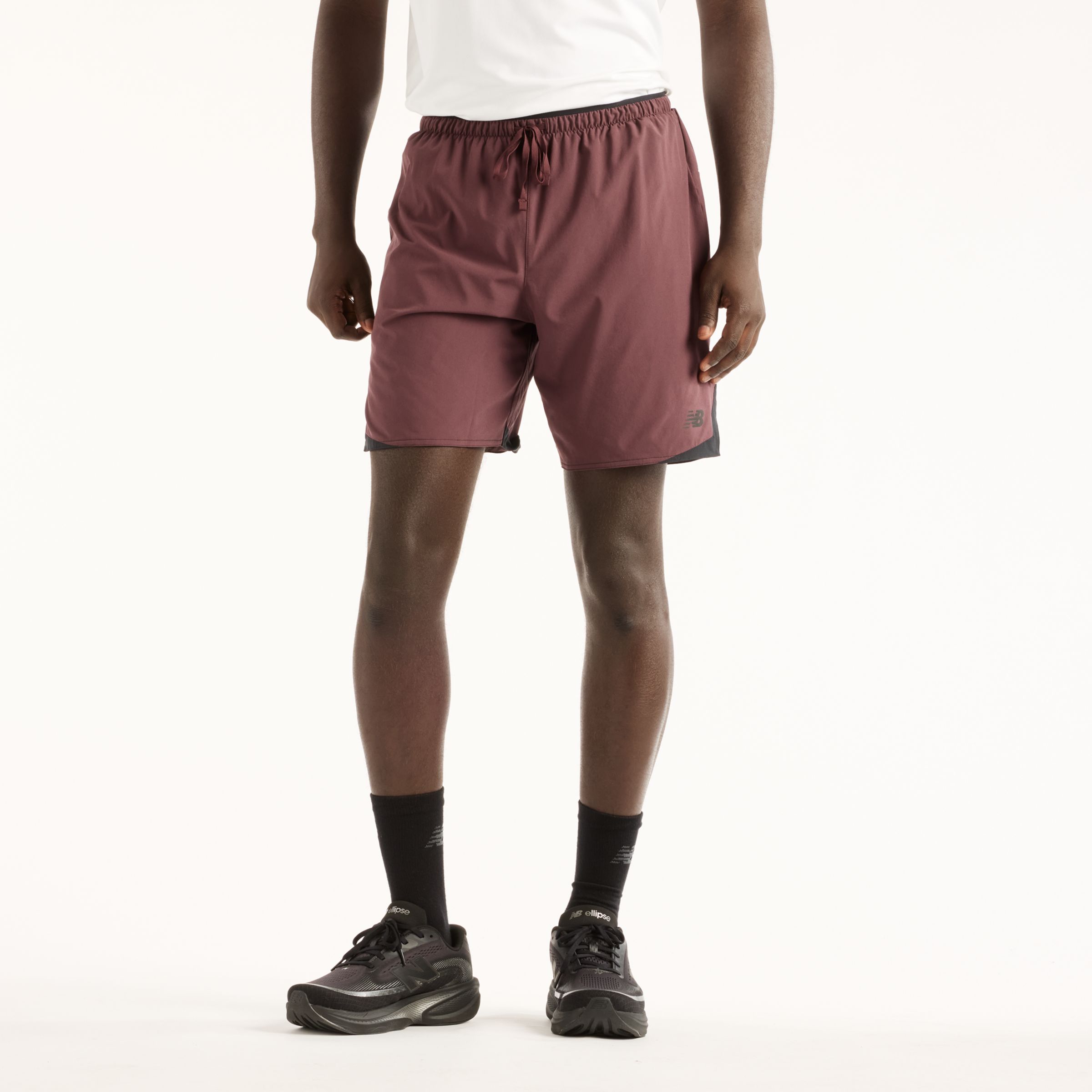 New Balance M&auml;n RC Essential Short 7" i Brun Polywoven