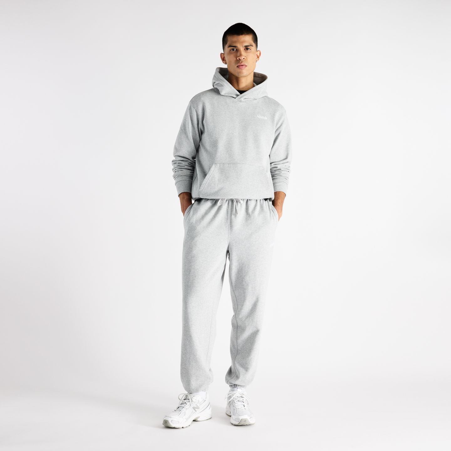 Мужские брюки New Balance Klutch Athletics French Terry, цвет: Серый меланжевый — фото 2