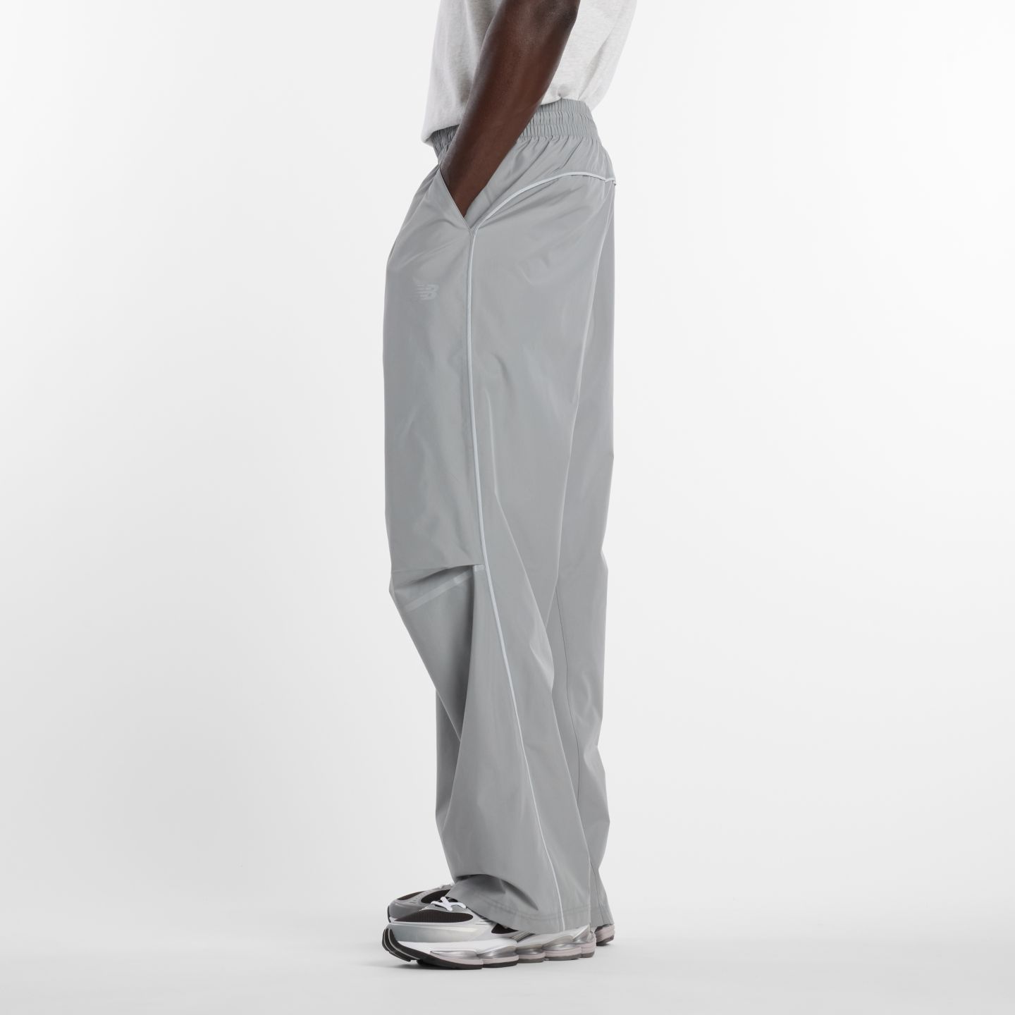 Мужские брюки New Balance Elusive Shell Pant, цвет: Сланцевый серый — фото 7