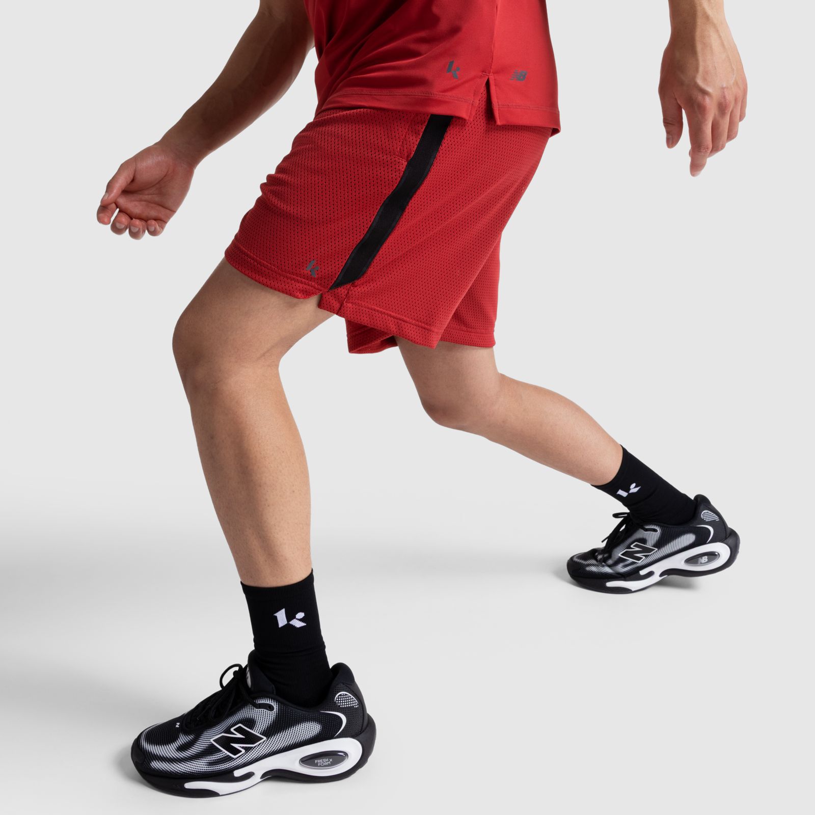 Мужские брюки New Balance Klutch Athletics 7" Mesh Short — фото 2