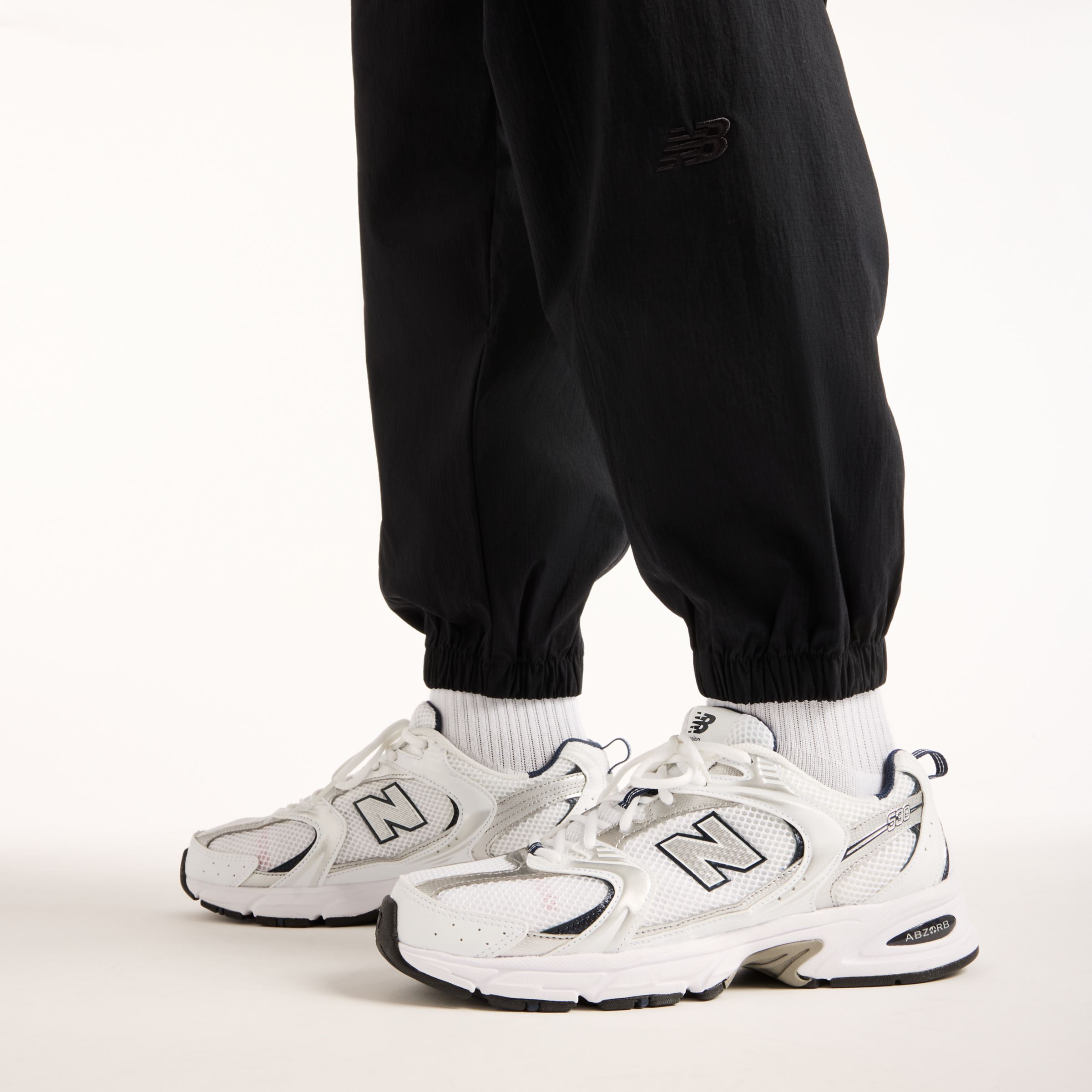 New Balance NB GREY ジョガーパンツ, MB62E7WZBK