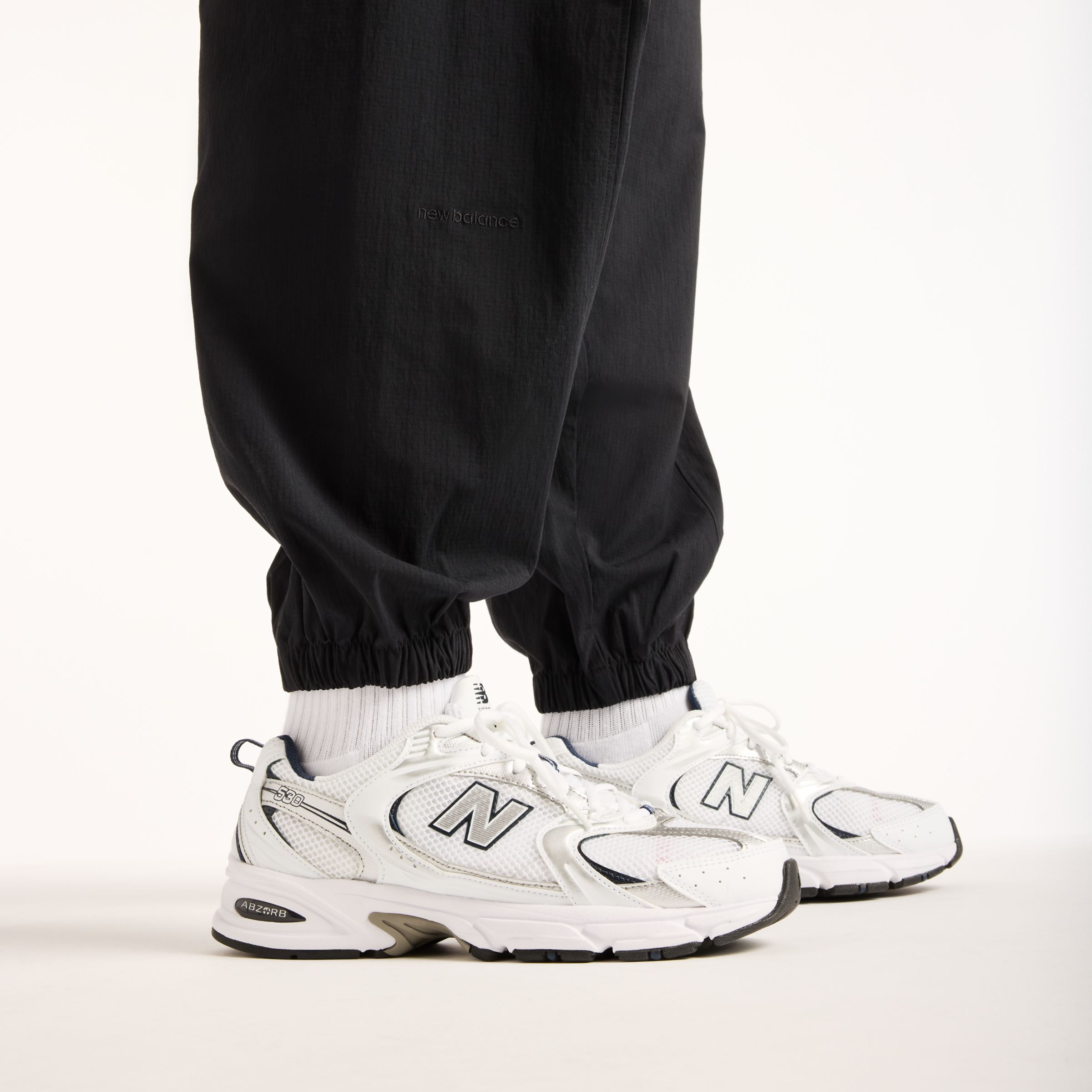 New Balance NB GREY ジョガーパンツ, MB62E7WZBK