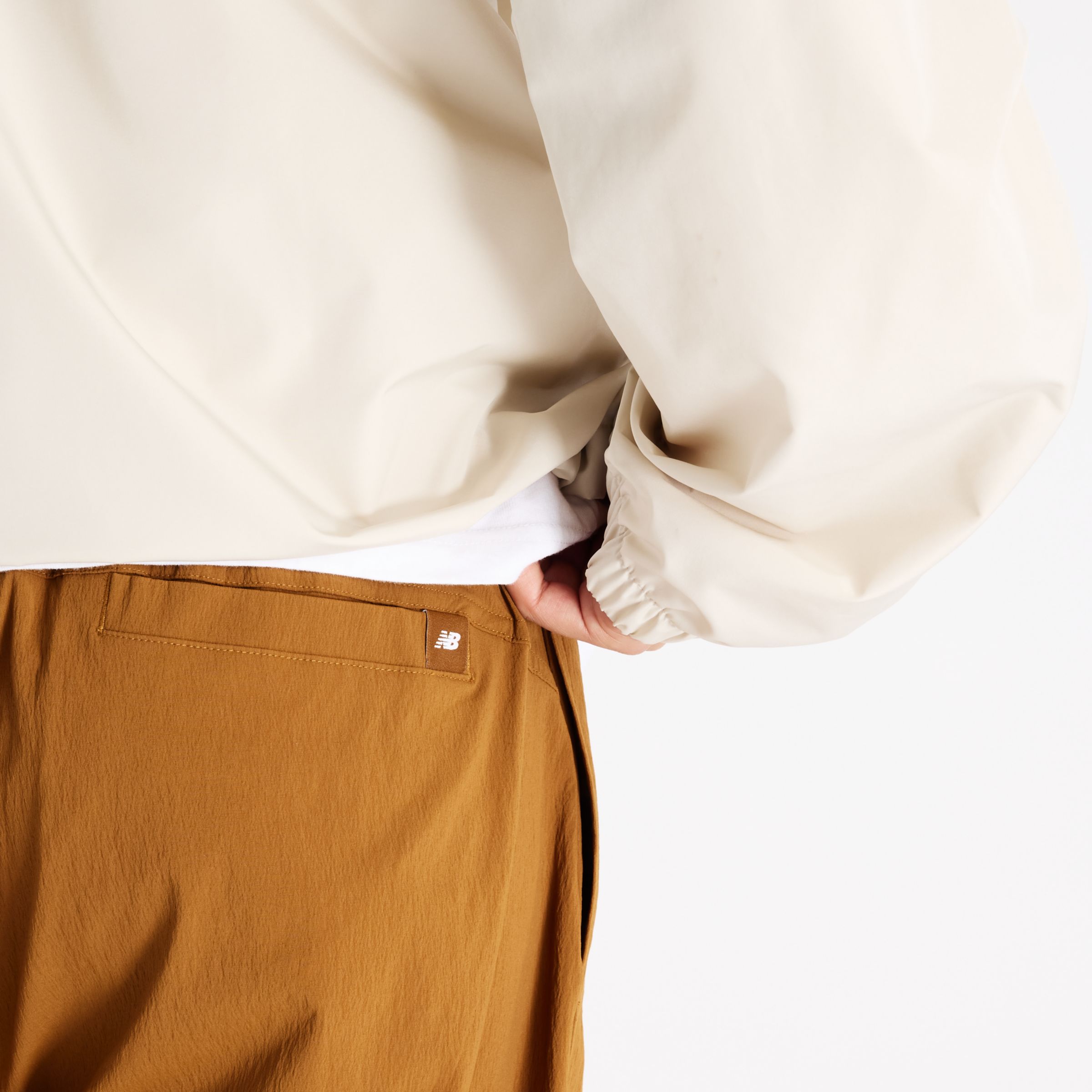 New Balance NBX Bottom Bar Woven Barrel Pant, MB62U9S2BFT