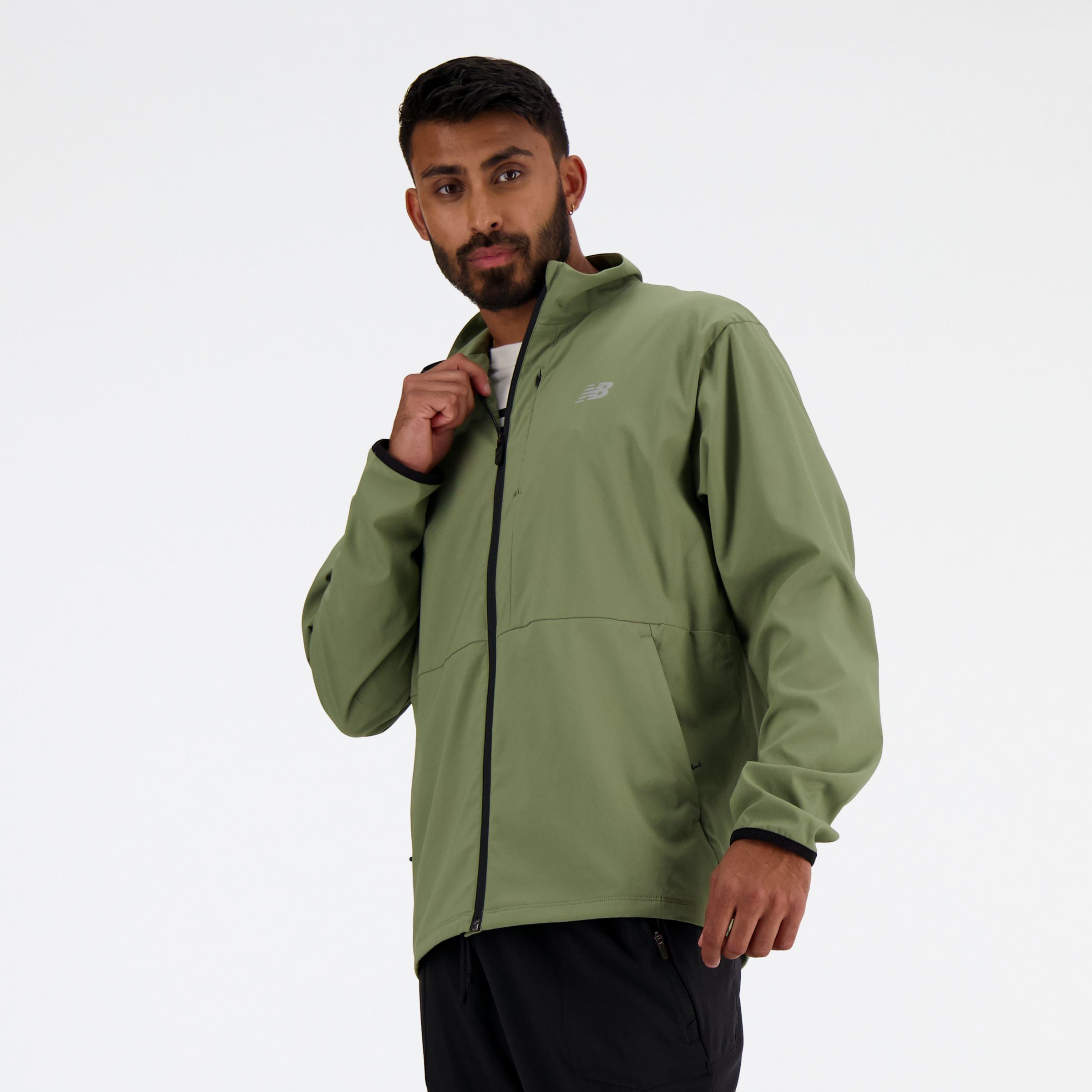 Shop New Balance Men's Stretch Woven Jacket In Green