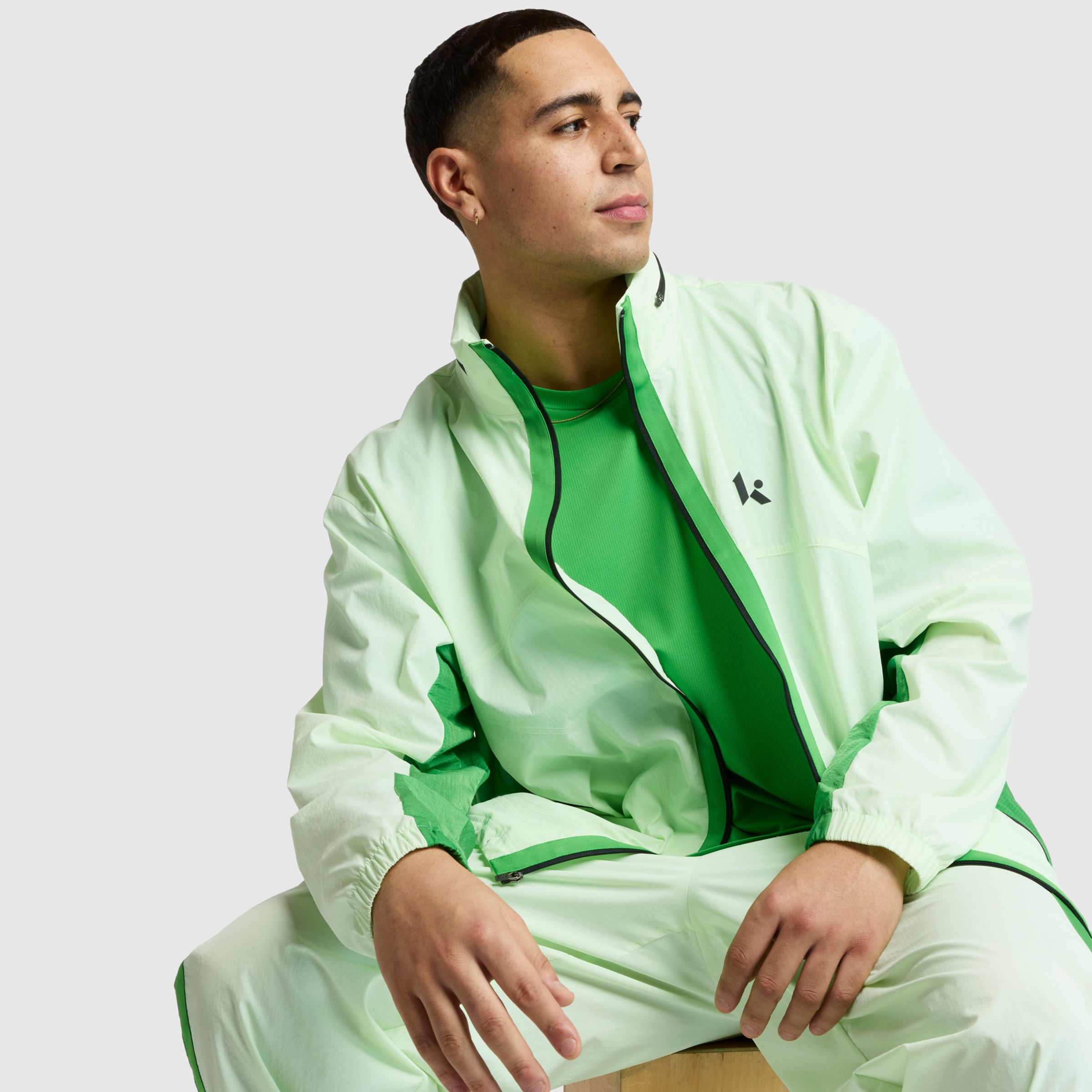 Shop New Balance Men's Klutch Men's Crinkle Woven Jacket In Green