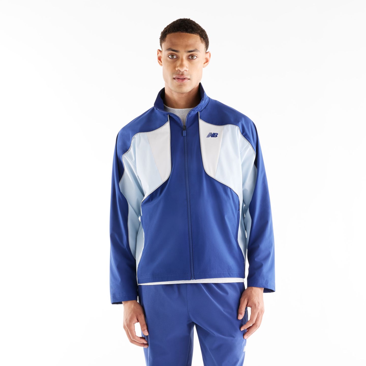Мужская куртка New Balance Kawhi Signature Track, цвет: Синий устричный — фото 1