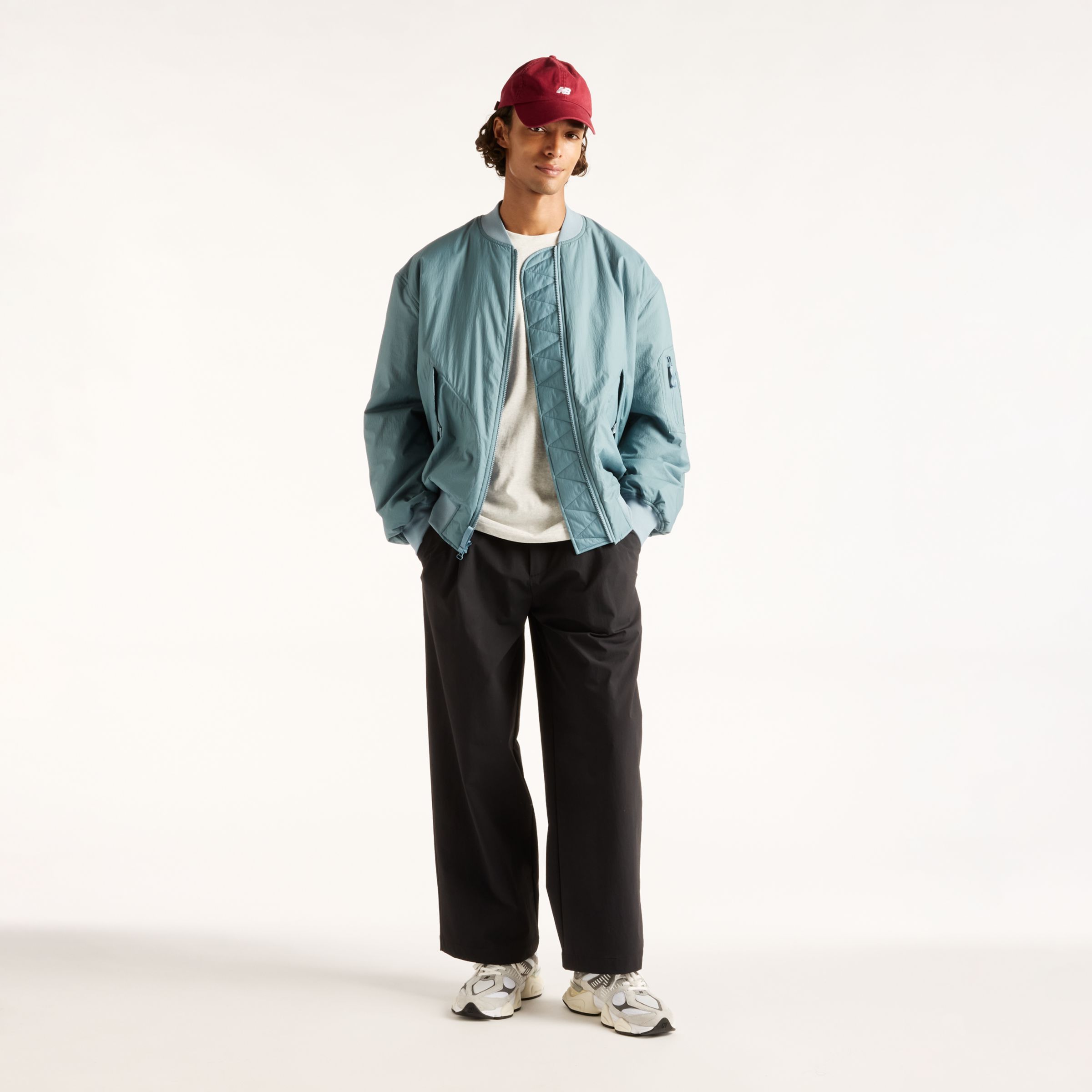 Djairo is wearing size M and is 6'0.5"/184cm. Chest: 37.25"/95cm, Waist: 29.5"/75cm, Hips: 37"/94cm