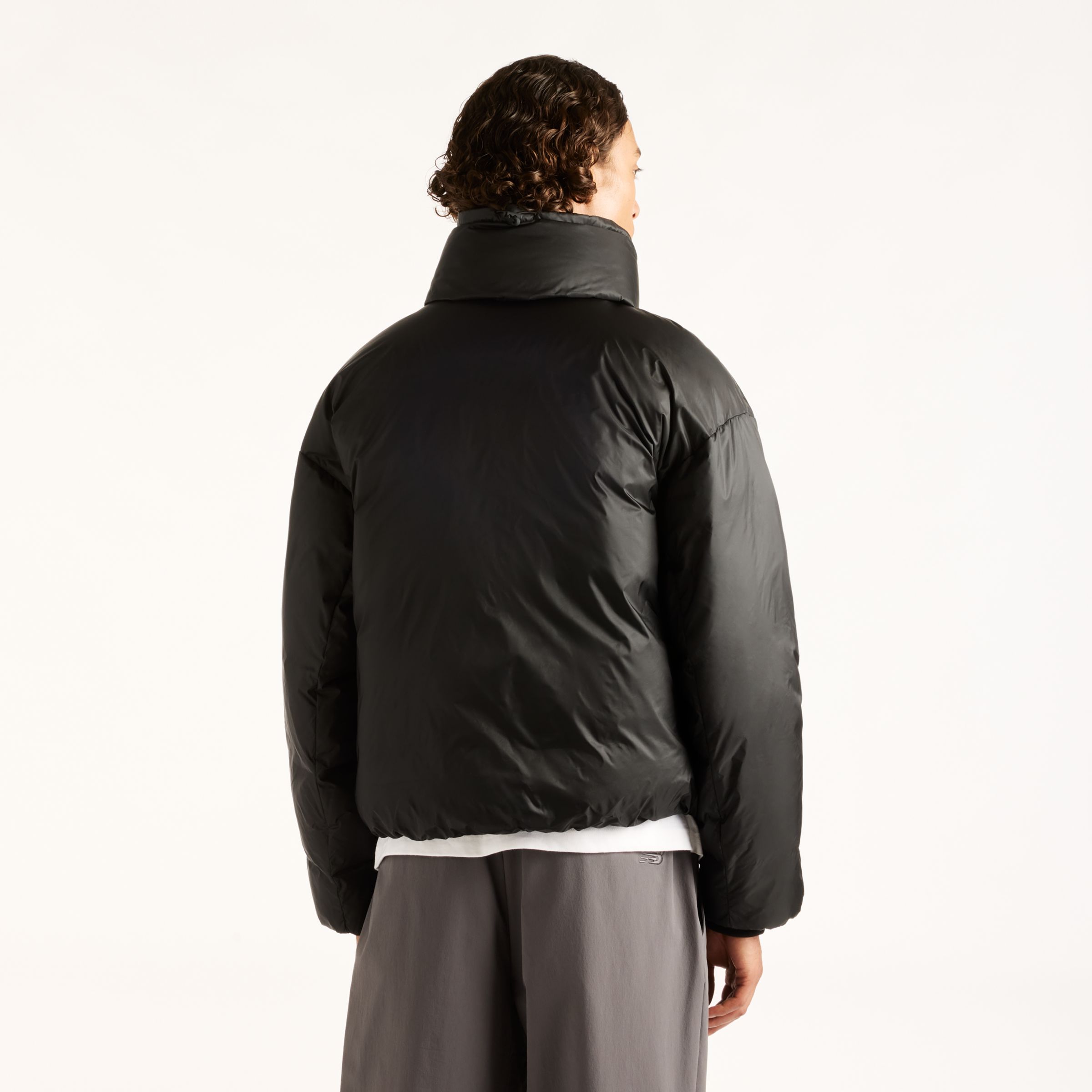 Djairo is wearing size M and is 6'0.5"/184cm. Chest: 37.25"/95cm, Waist: 29.5"/75cm, Hips: 37"/94cm