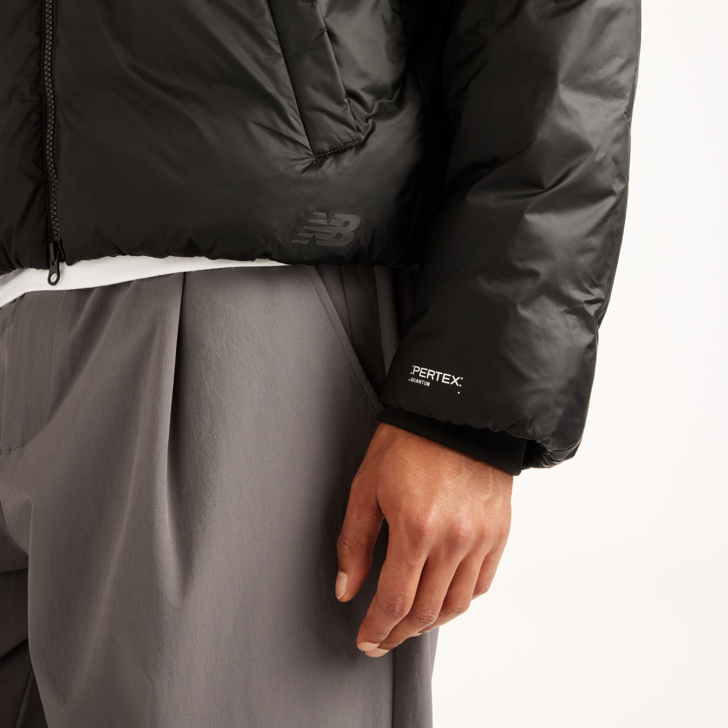 Djairo is wearing size M and is 6'0.5"/184cm. Chest: 37.25"/95cm, Waist: 29.5"/75cm, Hips: 37"/94cm