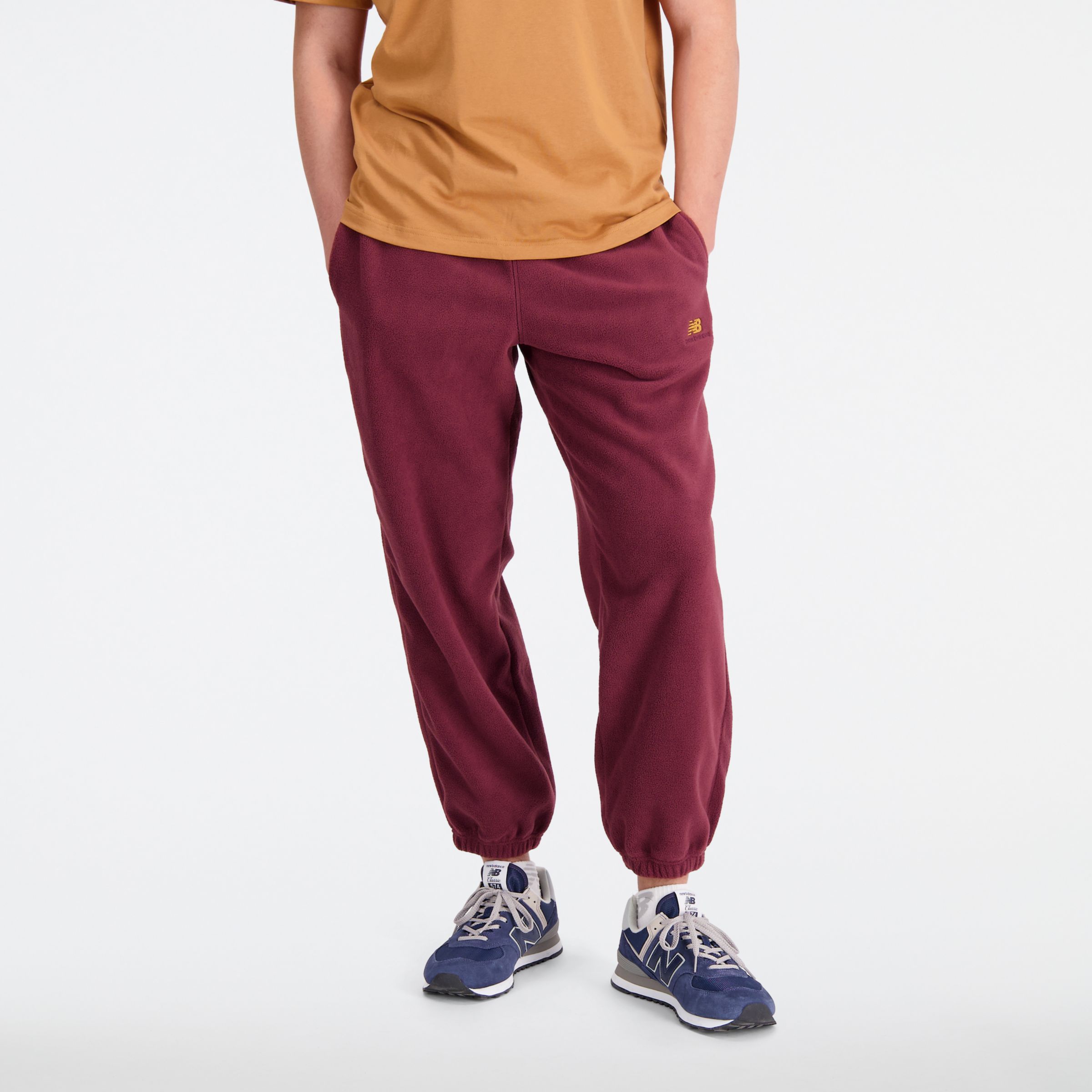 New Balance Men's Athletics Polar Fleece Pant in Red Poly Fleece, size Medium
