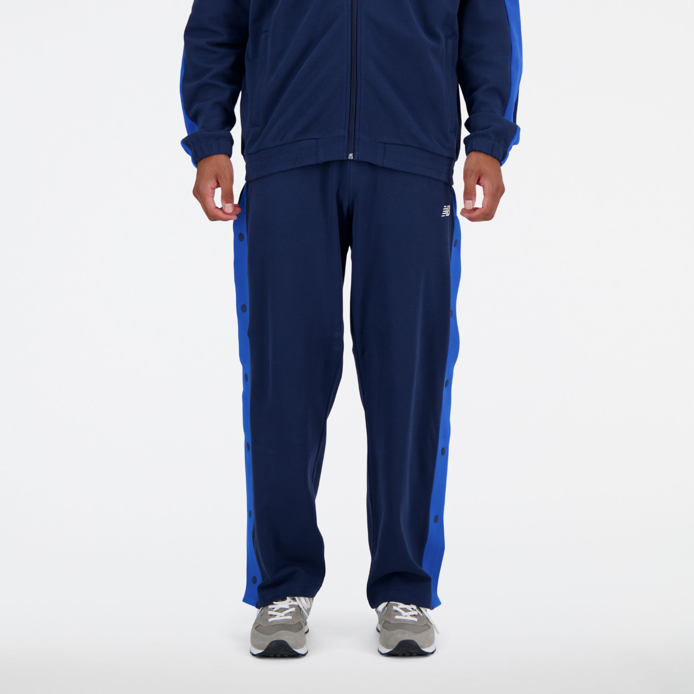 New Balance Men's Sportswear's Greatest Hits Snap Pant in Blue Poly Knit, size Medium