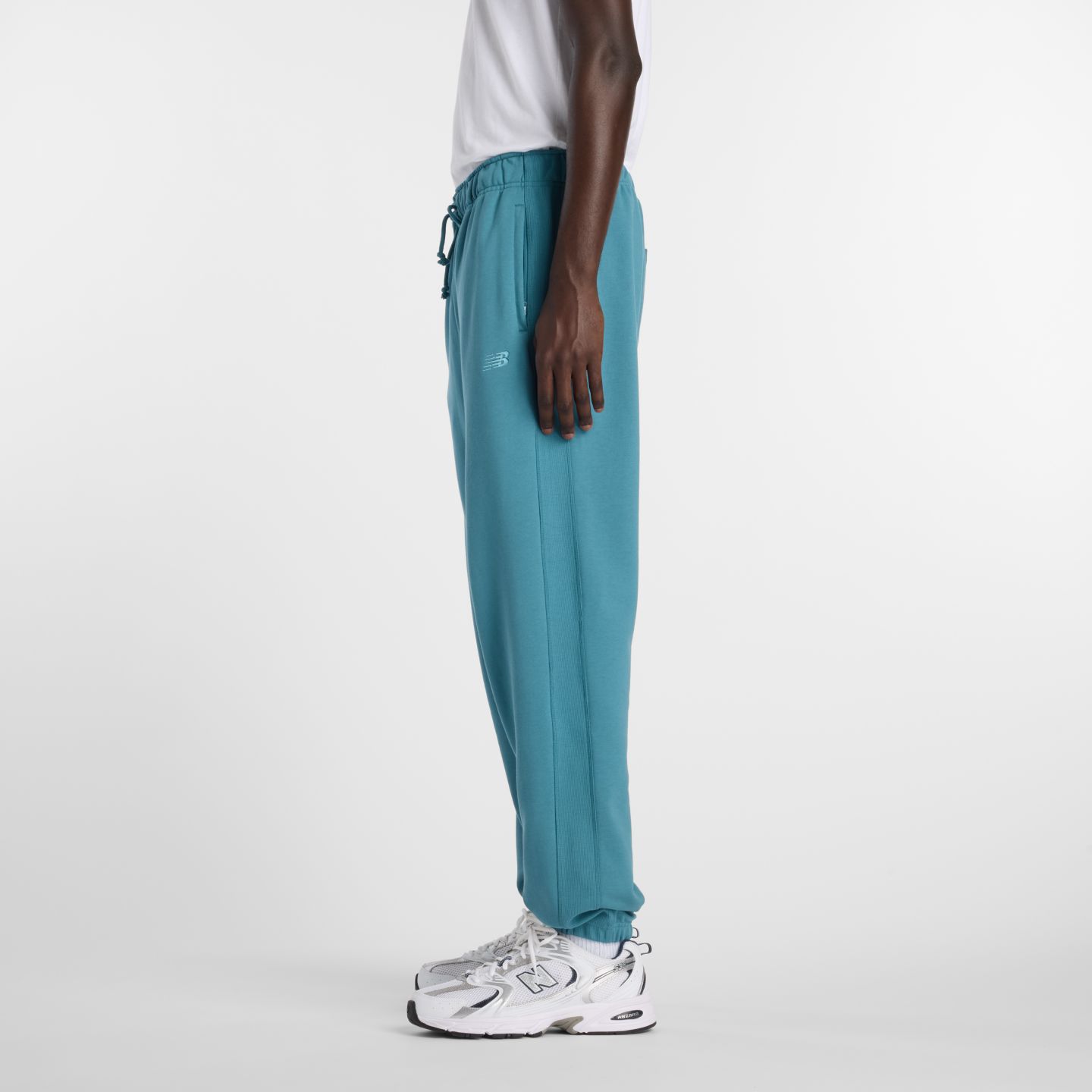 Мужские брюки New Balance Athletics French Terry Jogger, цвет: Бирюзовый — фото 5