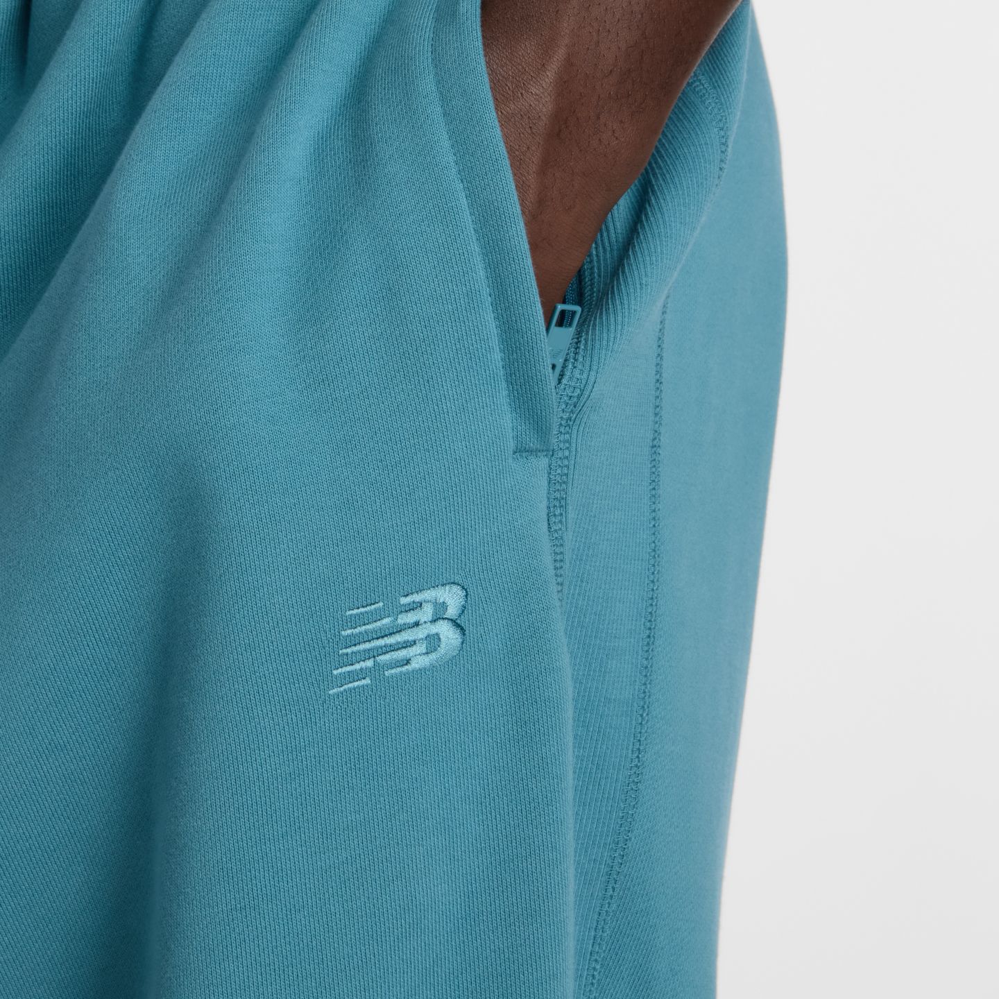 Мужские брюки New Balance Athletics French Terry Jogger, цвет: Бирюзовый — фото 6