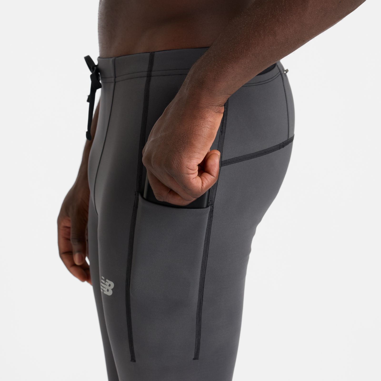 Мужские брюки New Balance Athletics Reflective Warming Pocket Tight — фото 3