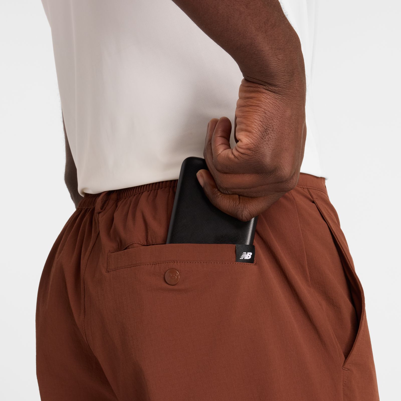 Мужские брюки New Balance Athletics Ripstop Standard Tapered Pant 32" — фото 8