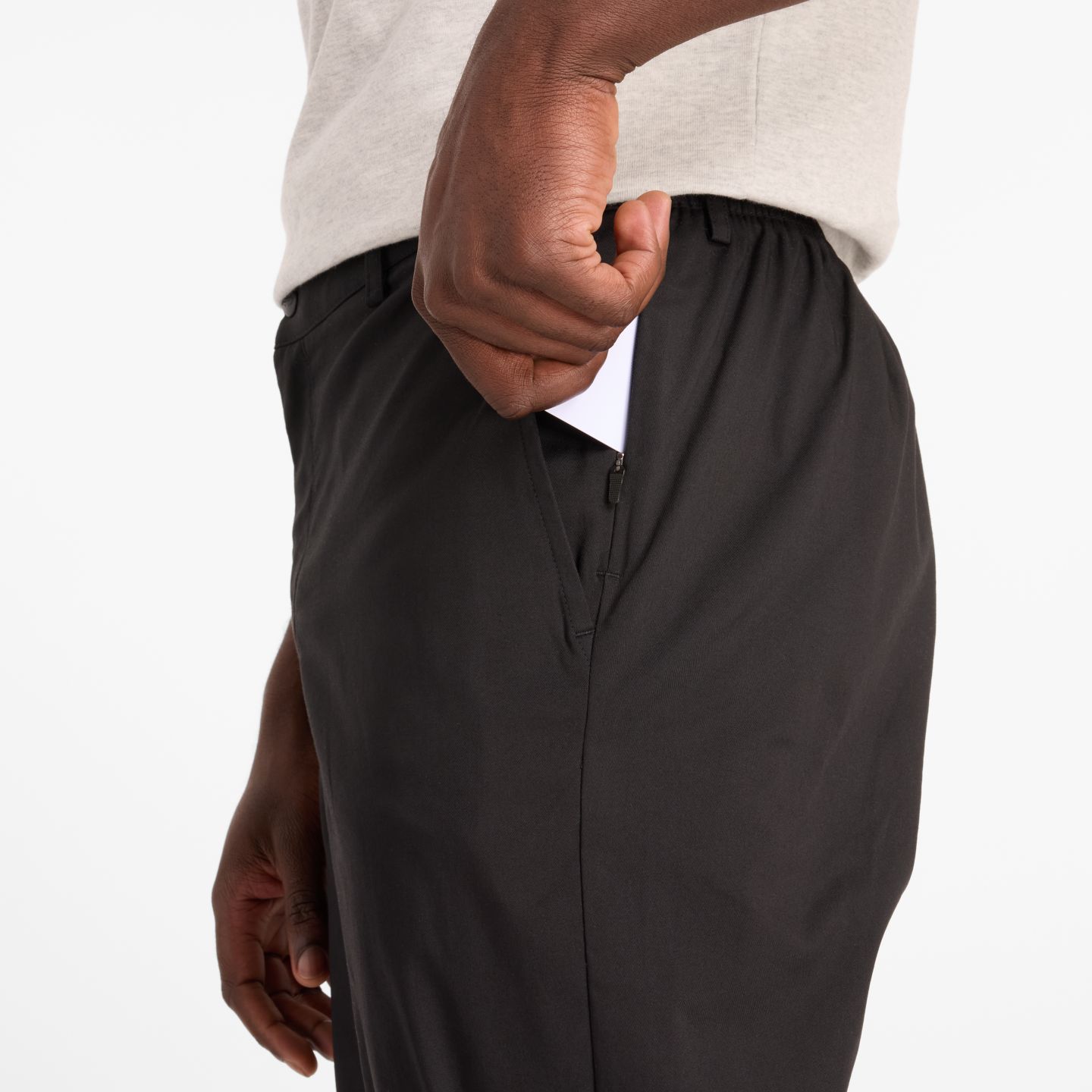 Мужские брюки New Balance Athletics Standard Tapered Pant 28", цвет: Чёрный — фото 7