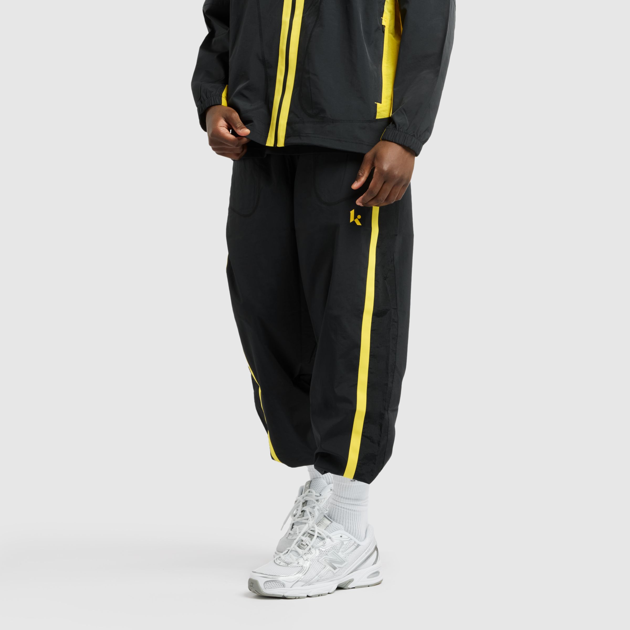 

New Balance Men's Klutch Men's Crinkle Woven Pant Black - Black