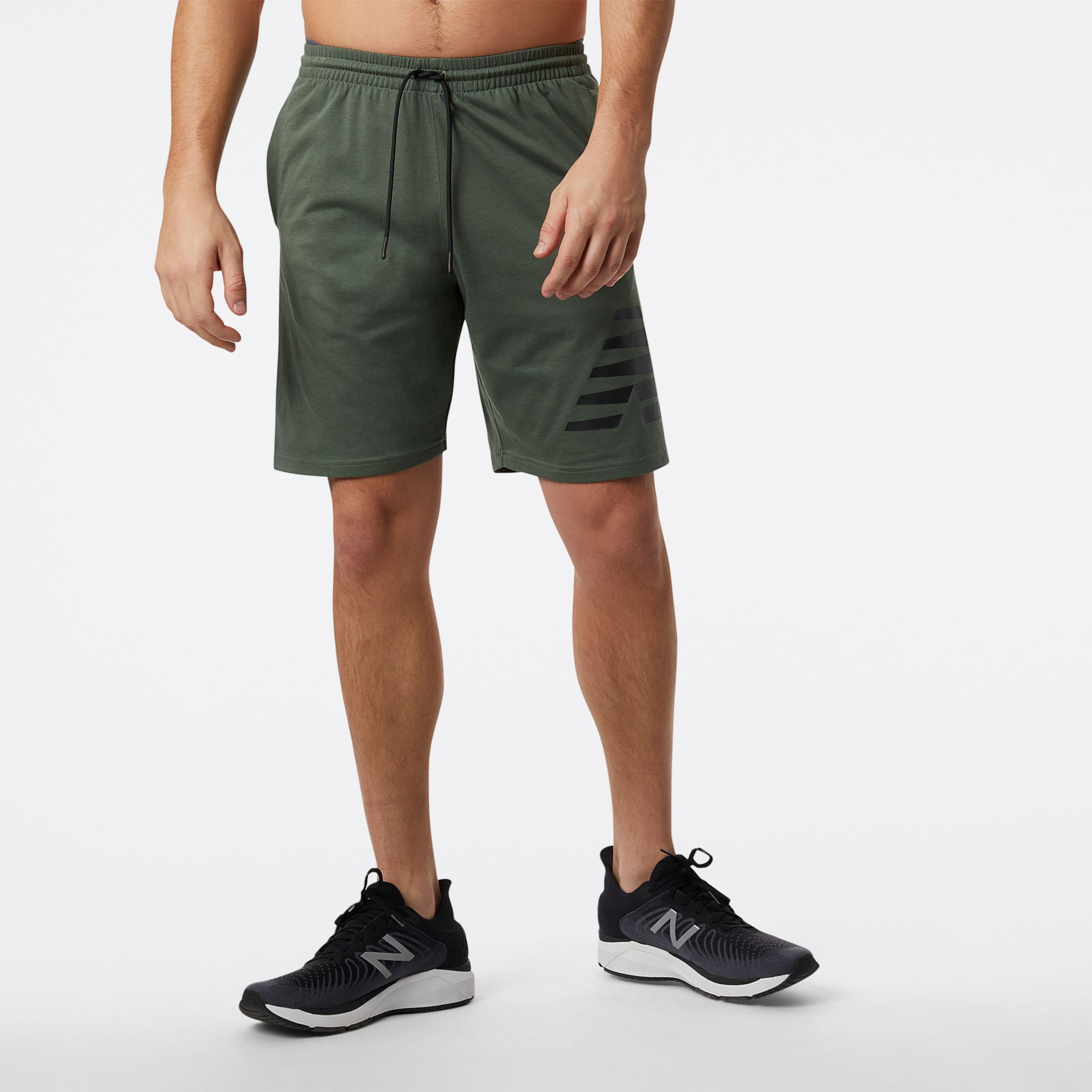 New Balance Homme Short Heathertech Knit en Green/vert, Cotton, Taille XS