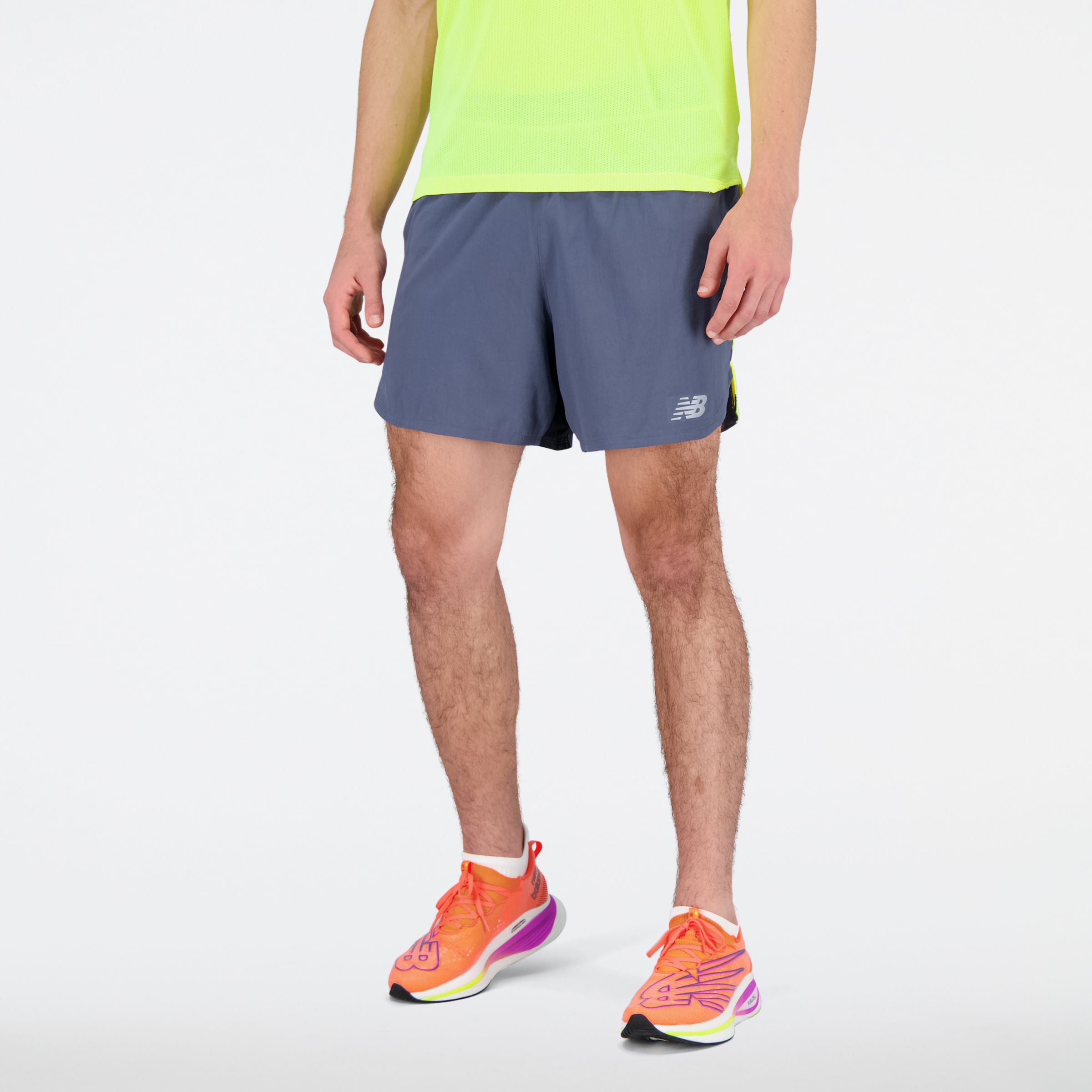 New Balance Homme Short Impact Run 5 Inch en Jaune, Polytissé, Taille S