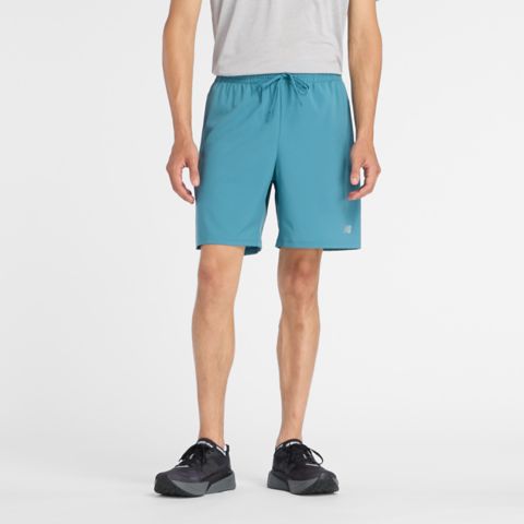 Мужские шорты New Balance Sport Essential Short 7", цвет: Бирюзовый / Серый