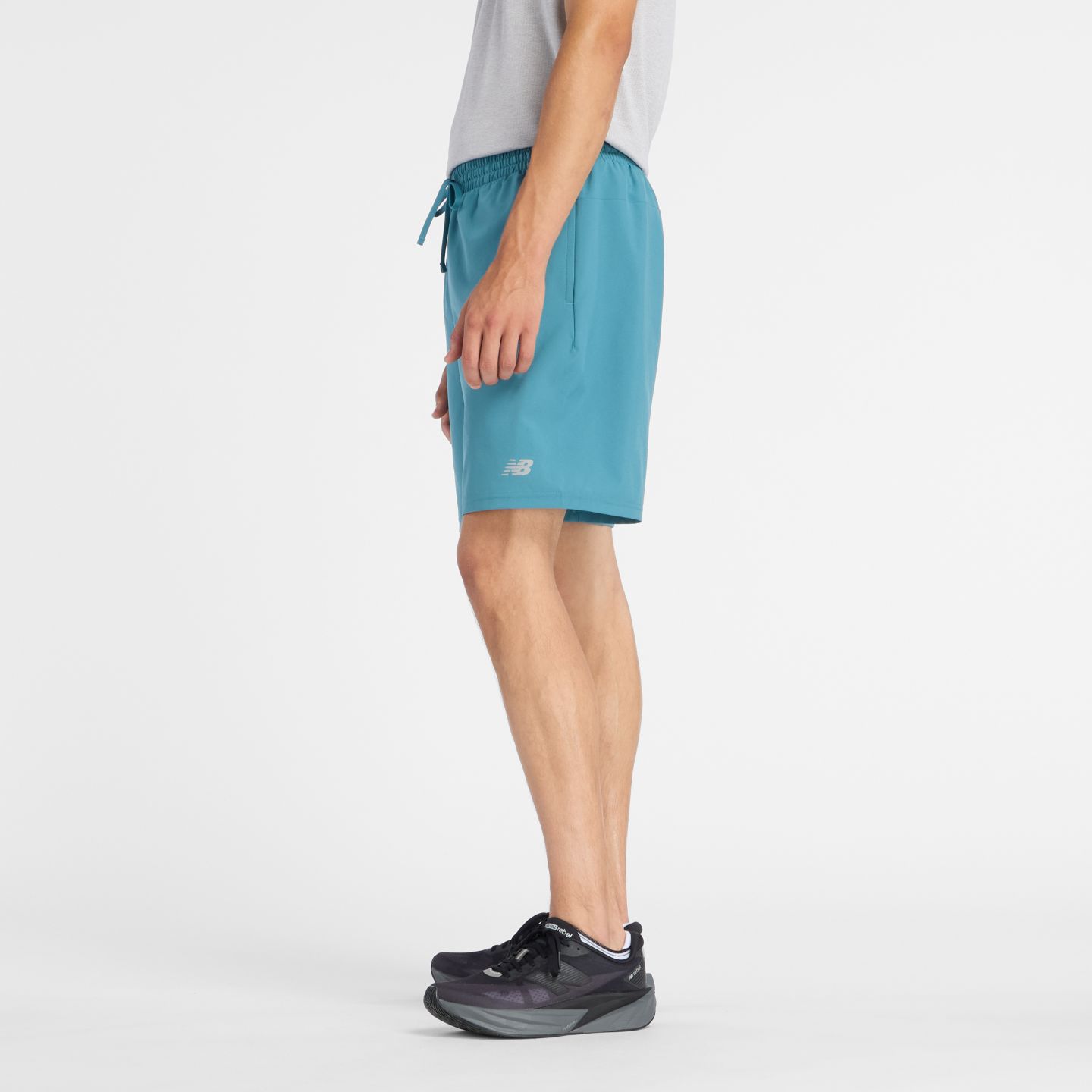 Мужские шорты New Balance Sport Essential Short 7", цвет: Бирюзовый / Серый — фото 4