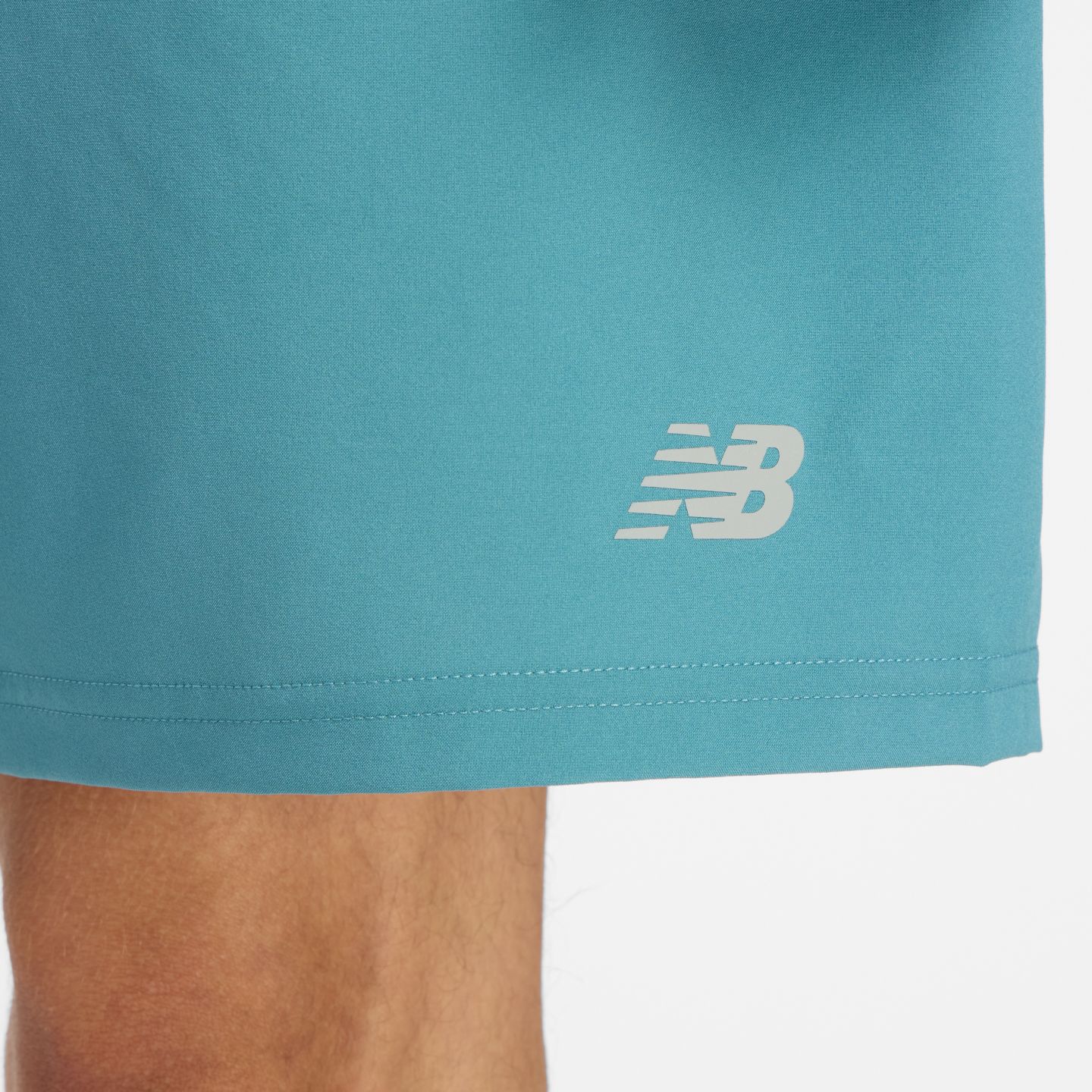 Мужские шорты New Balance Sport Essential Short 7", цвет: Бирюзовый / Серый — фото 6