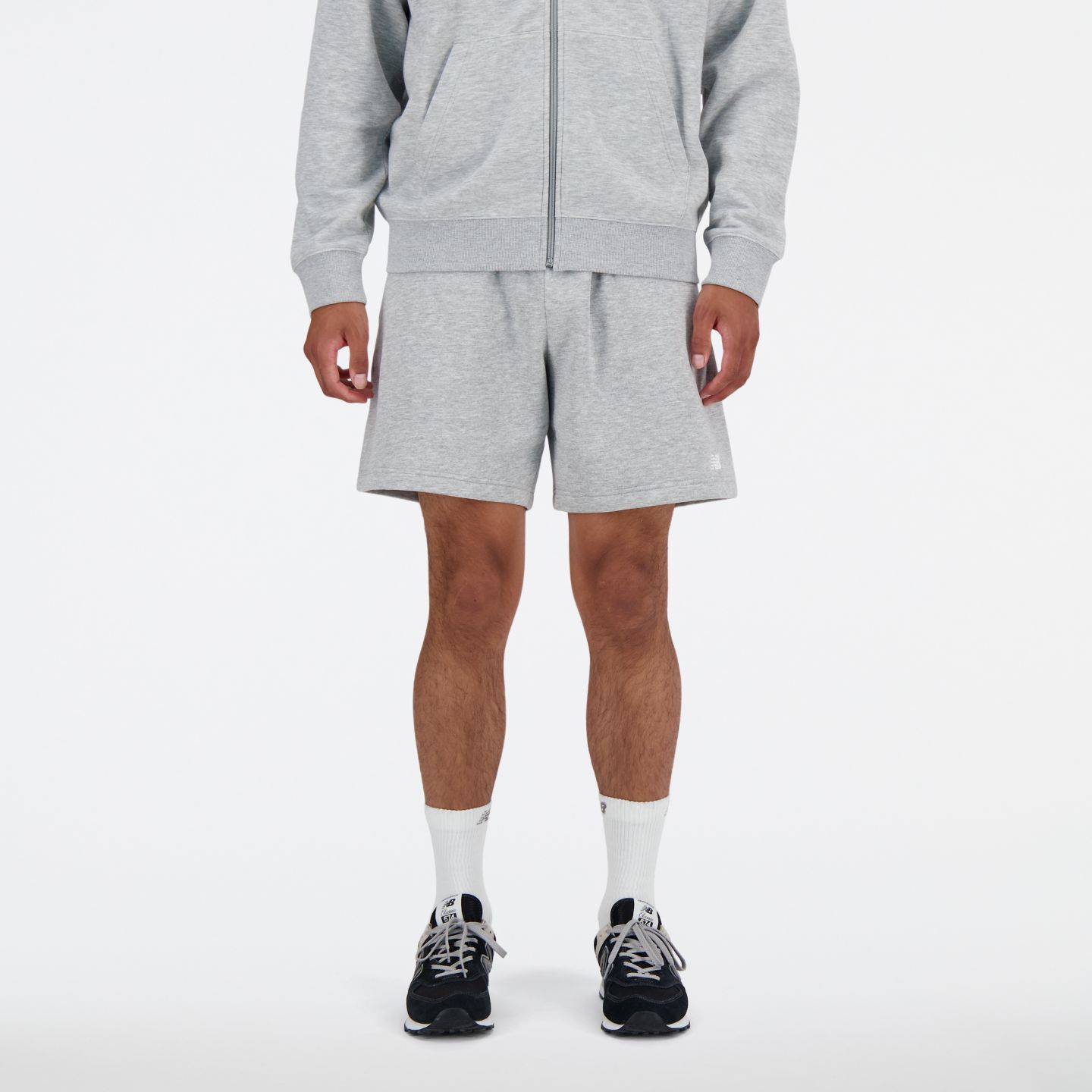 Мужские шорты New Balance Sport Essentials Fleece Short 7", цвет: Серый / Белый — фото 1