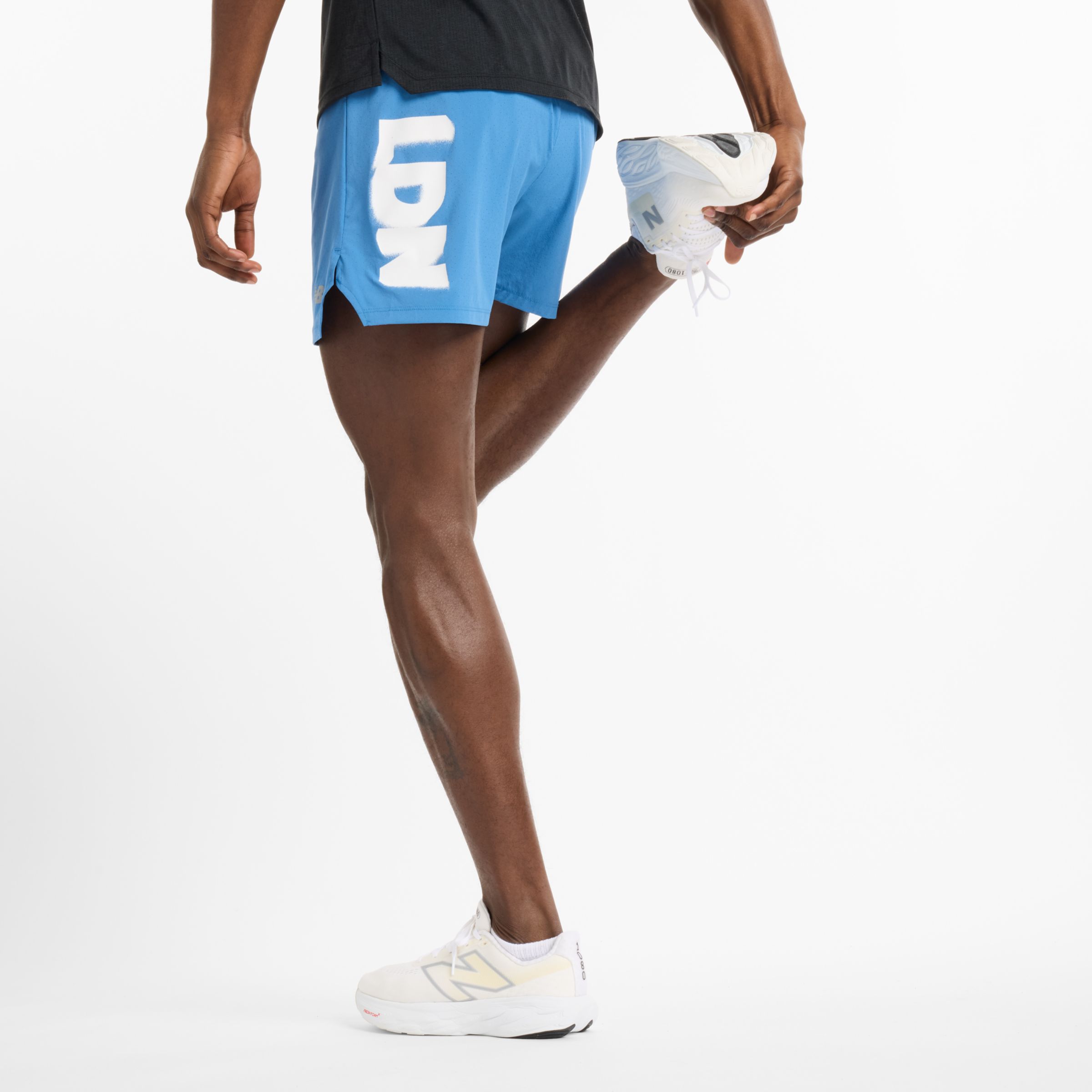 New Balance Men's London Edition RC Short 5" in Blue Polywoven, size Large