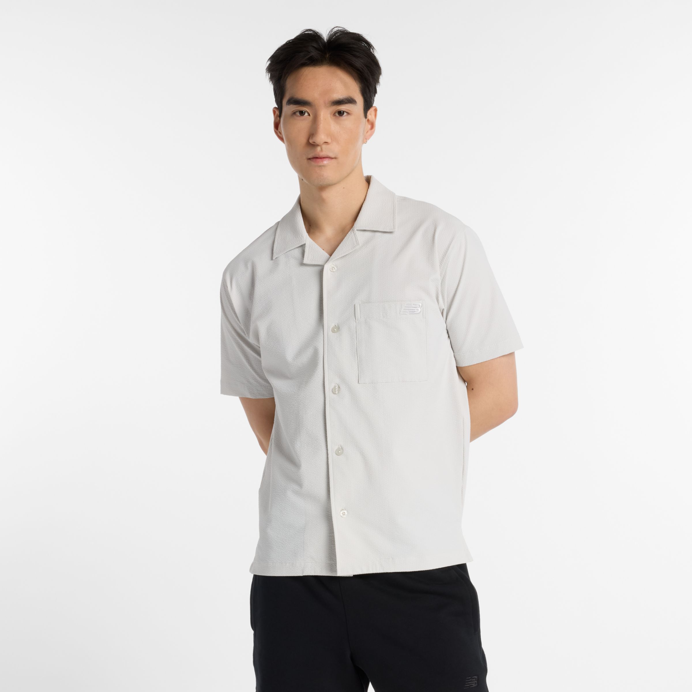 New Balance Uomo Seersucker Button Up Short Sleeve, Politessuto, Taglia M
