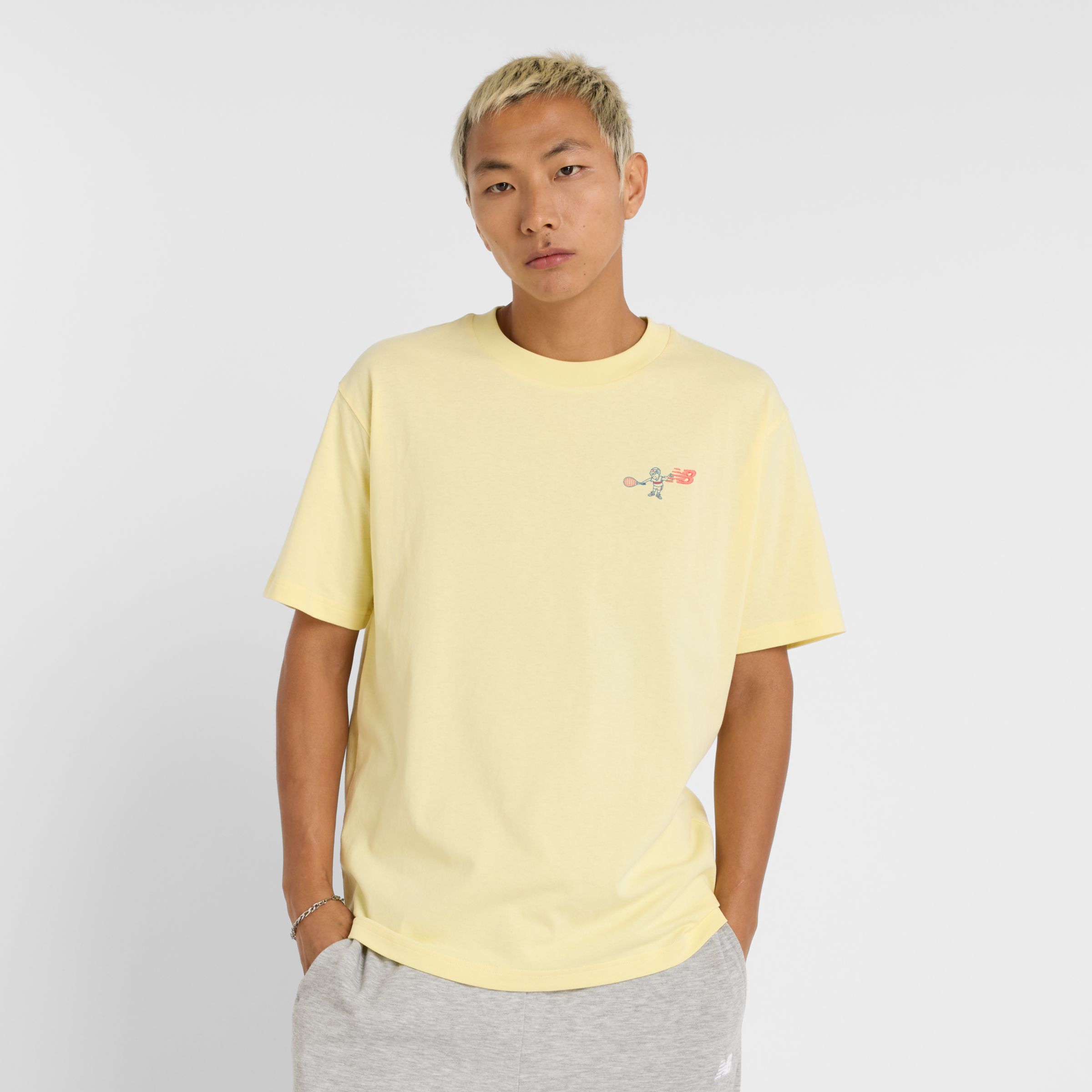 New Balance Men's Athletics Tennis Cartoon T-Shirt in Yellow Cotton, size Medium