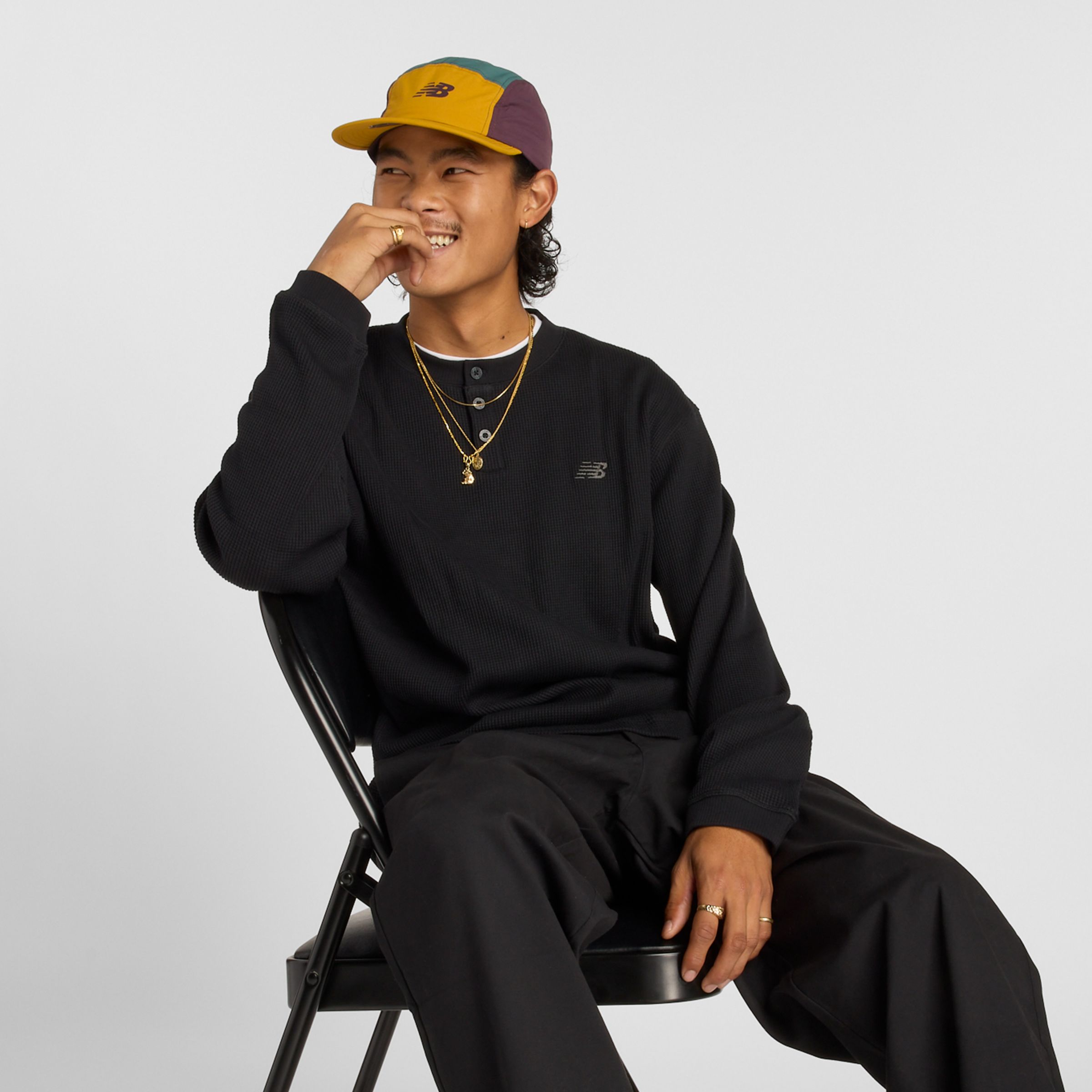 New Balance Men's Numeric Waffle Knit Long Sleeve Henley in Black Cotton, size Medium