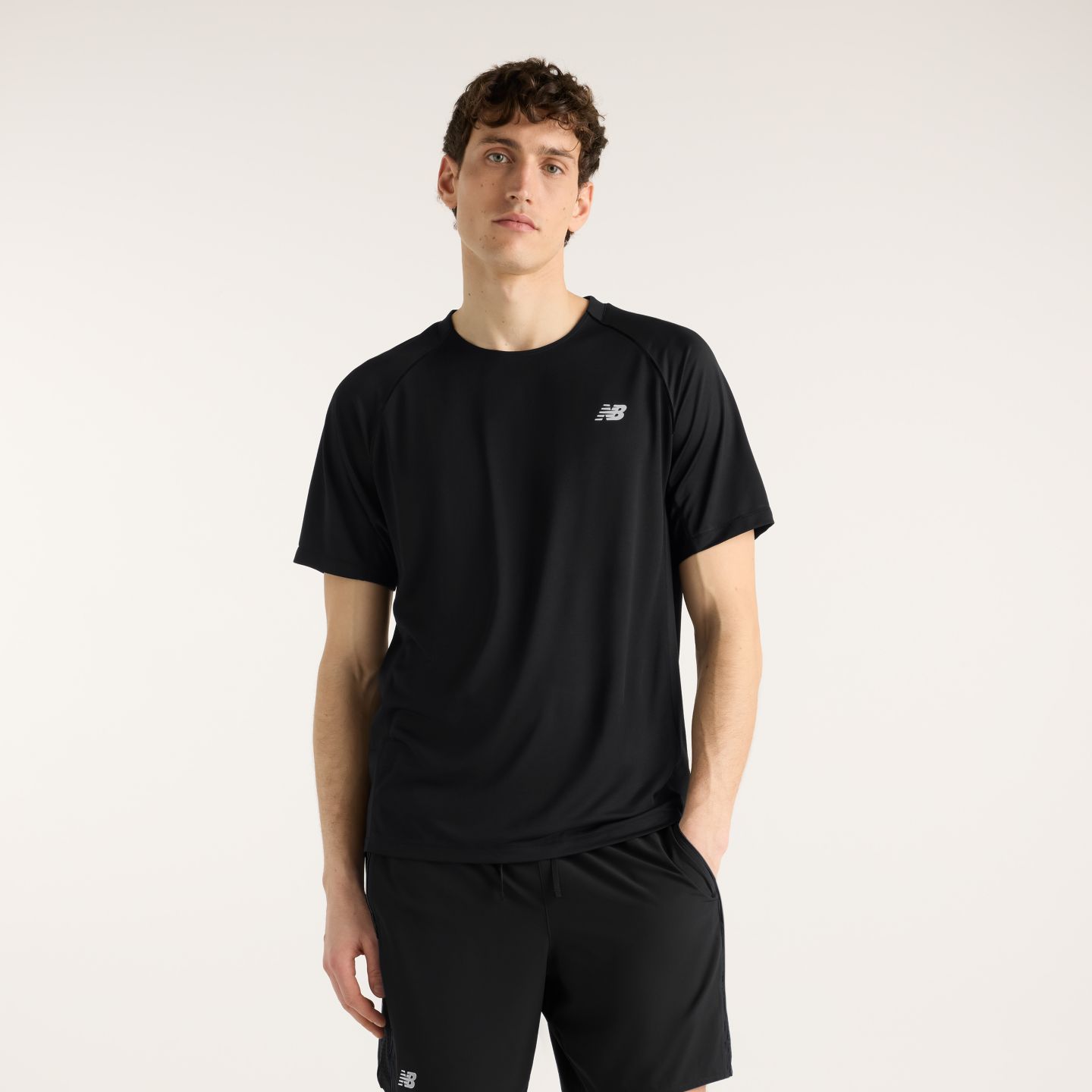Мужской топ New Balance Tournament, цвет: Чёрный / Белый — фото 1