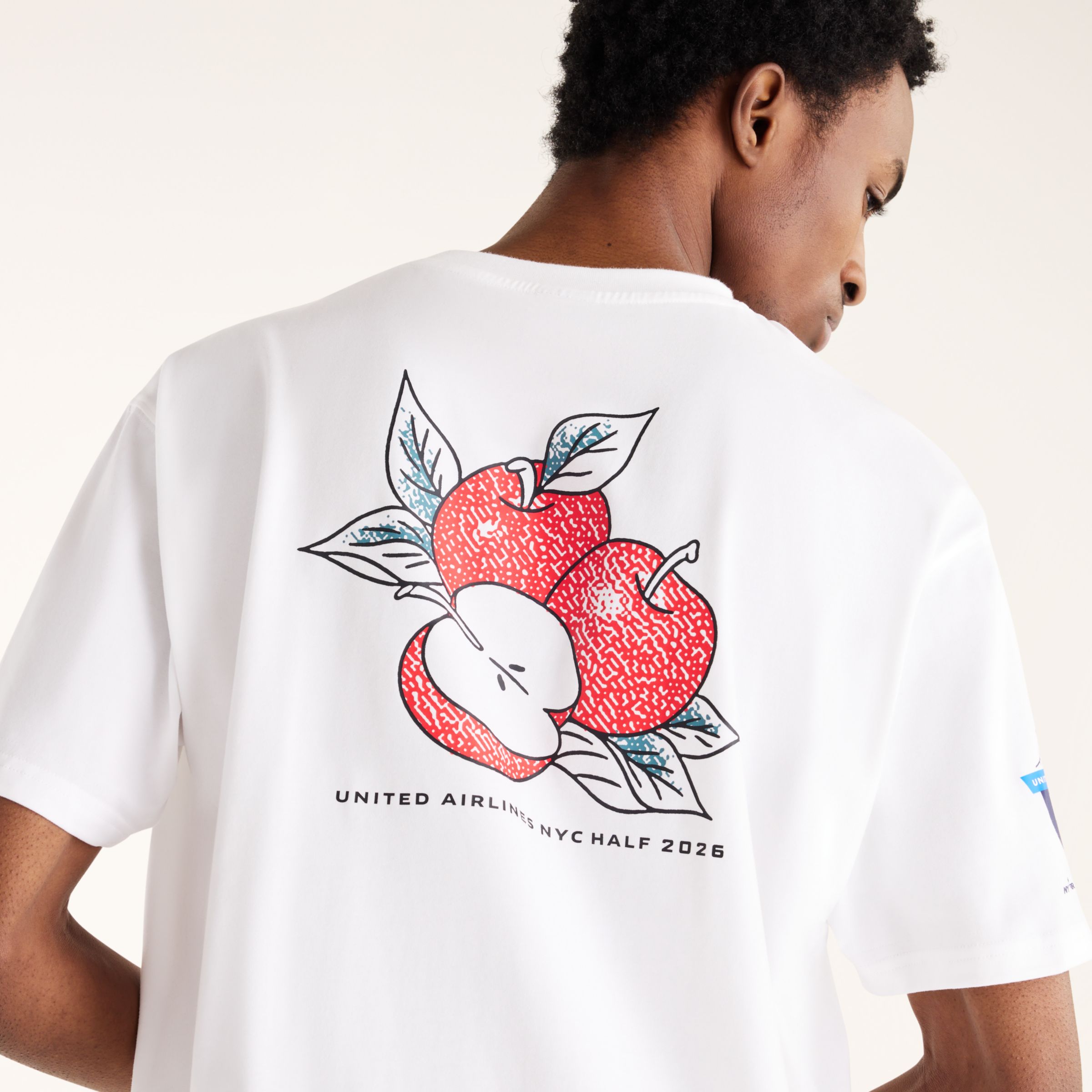 United Airlines NYC Half Men's Graphic T-Shirt - Apple