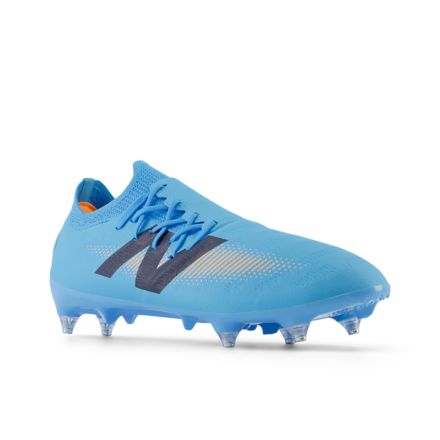 New balance best sale football boots kids