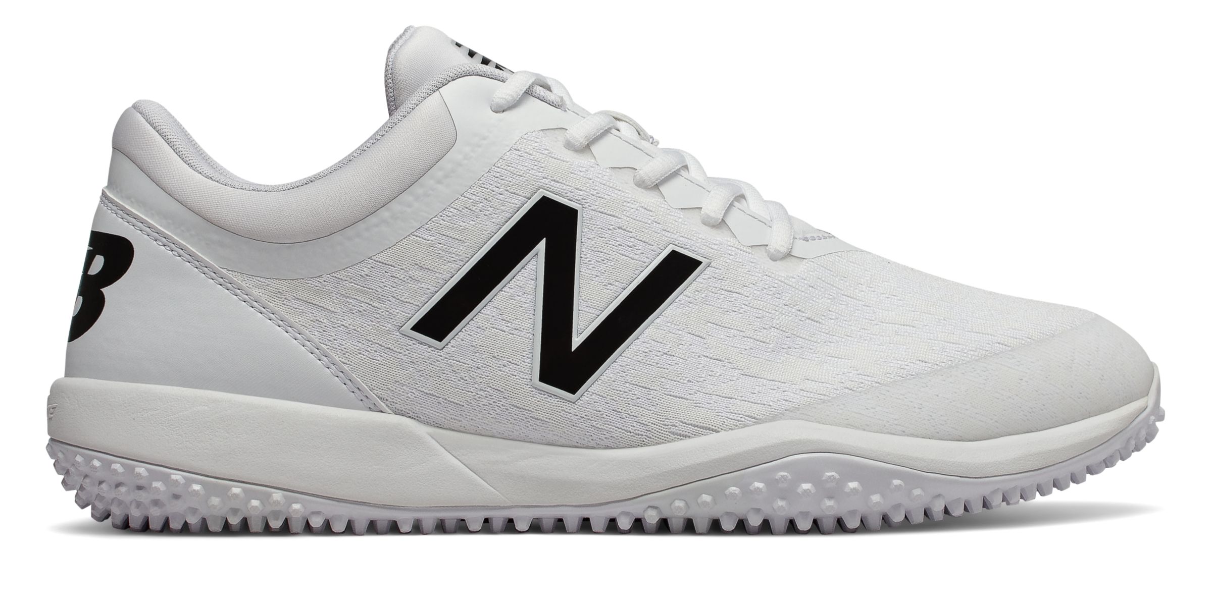 black and white new balance turf shoes