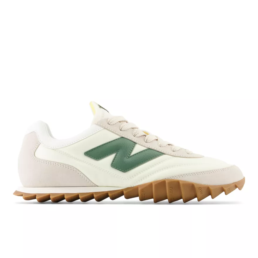 This is the New Balance RC30 sneaker in beige and green.