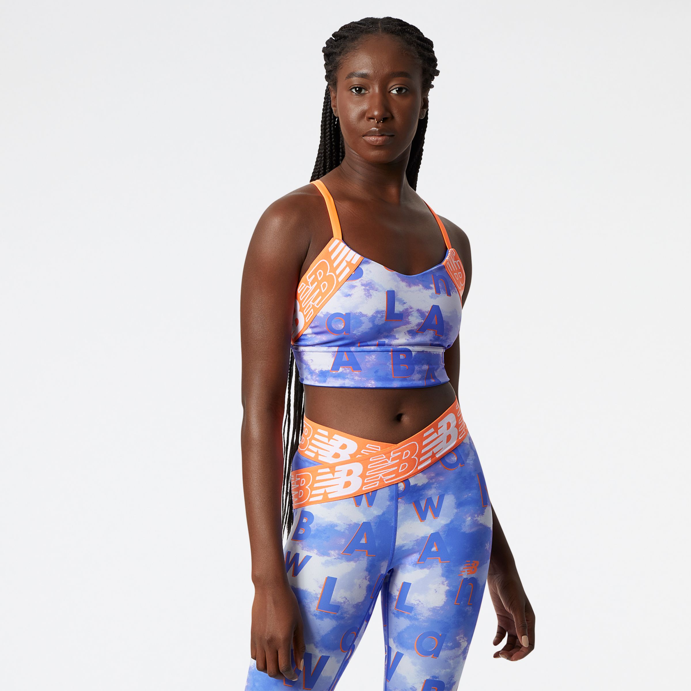 New Balance Mulheres Relentless Printed Crop Bra in Azul, Poly Knit, Tamanho S