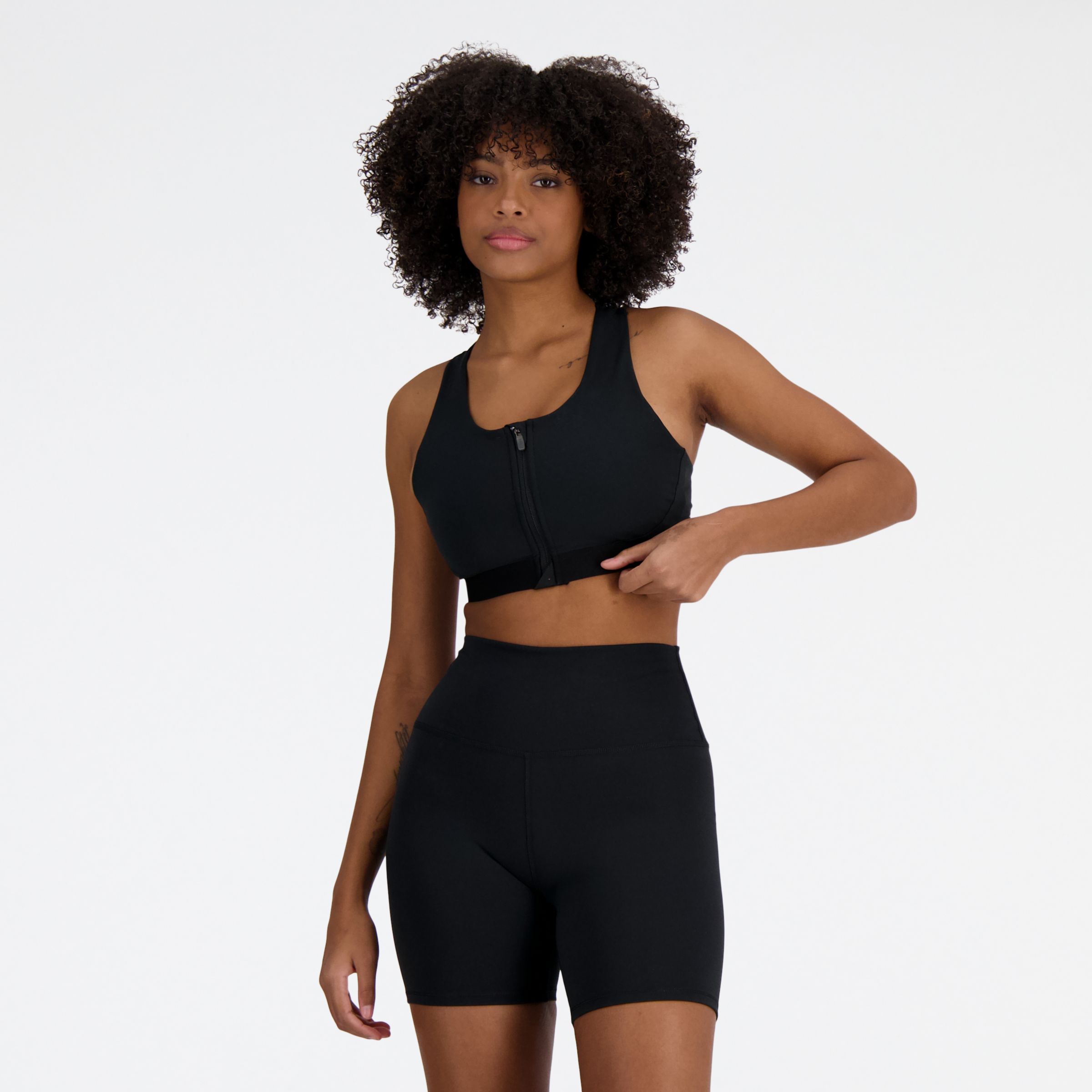New Balance Women's Nb Sleek Medium Support Pocket Zip Front Bra In Black