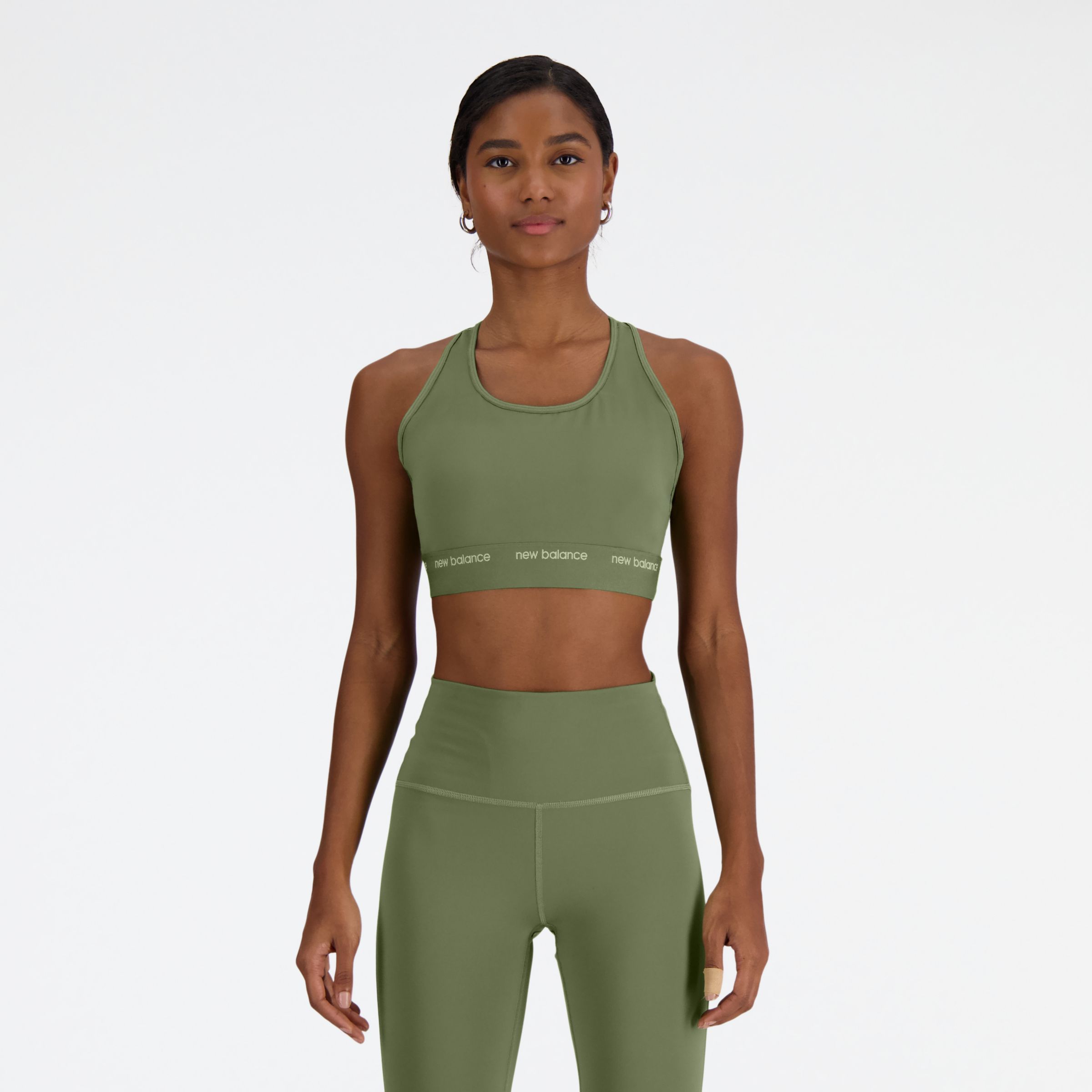 New Balance Women's NB Sleek Medium Support Sports Bra in Green Poly Knit, size Small