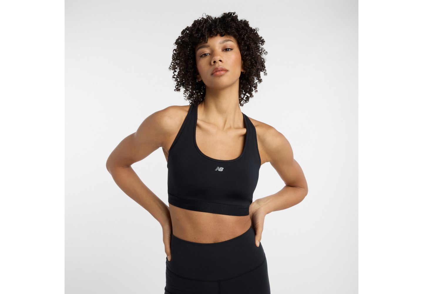 New Balance NB Essential Run Bra in Black — photo 1 of 1